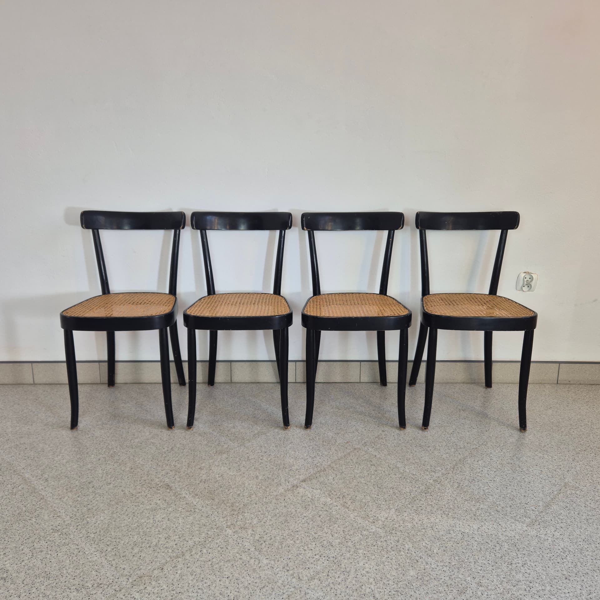 Set of chairs, black wood, brown rattan, by M. Moser, Horgenglarus, Switzerland, 1940s. - 300067