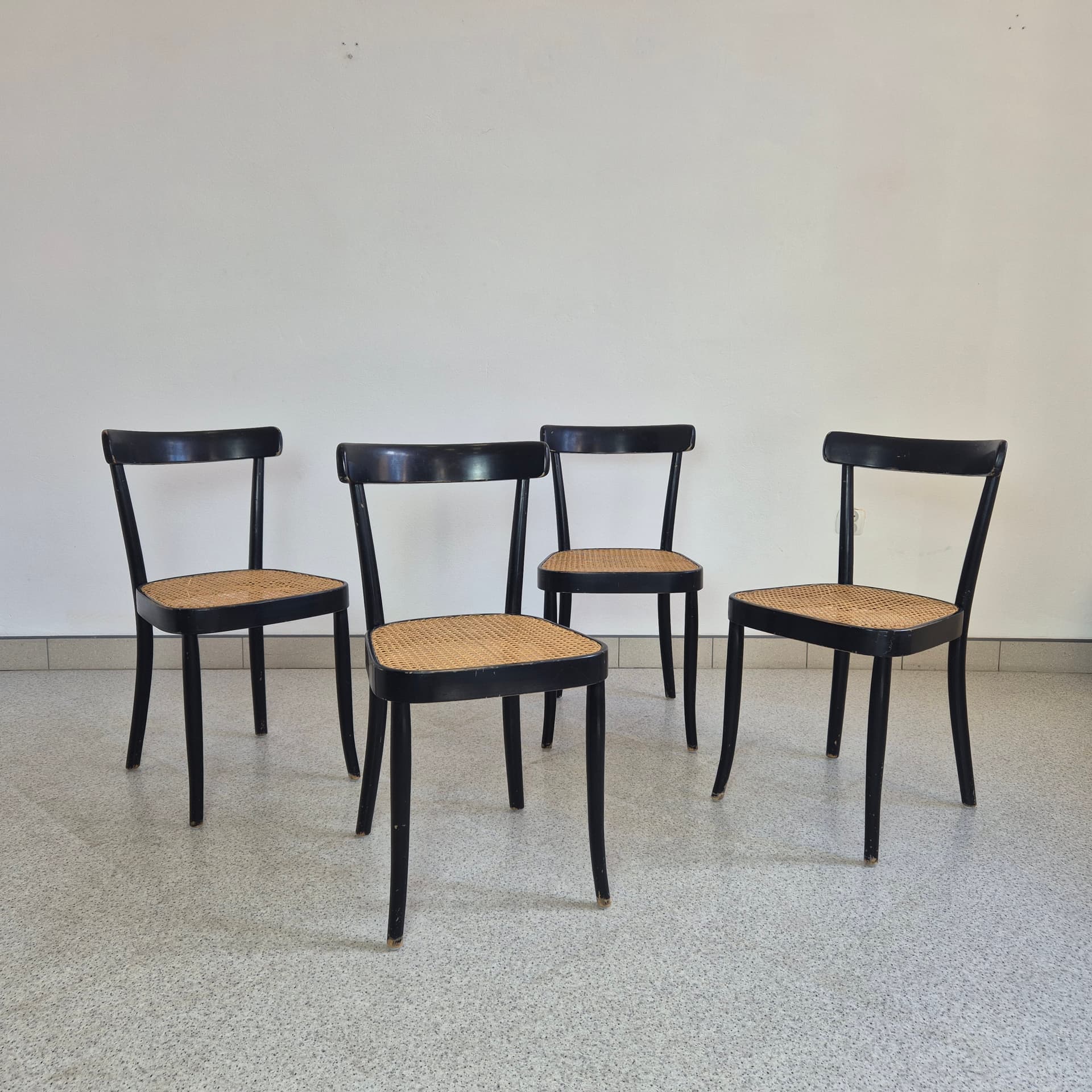 Set of chairs, black wood, brown rattan, by M. Moser, Horgenglarus, Switzerland, 1940s. - 300066