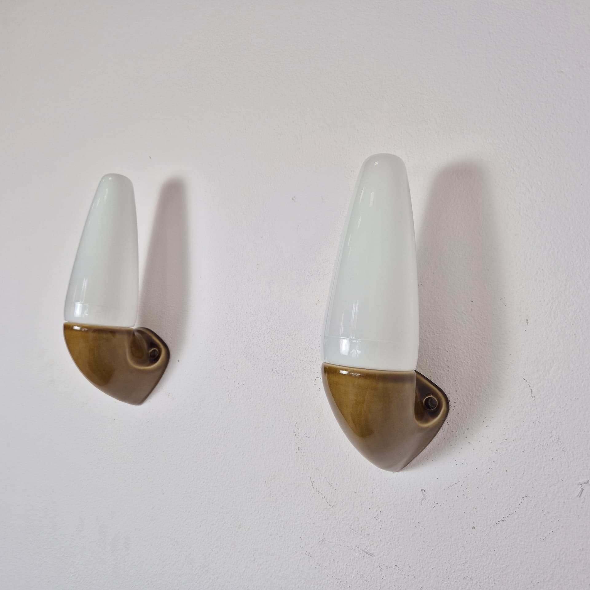 Pair of wall sconces, olive-brown stoneware, white opaline glass, by S. Bernadotte, Sweden, 1970s. - 300115