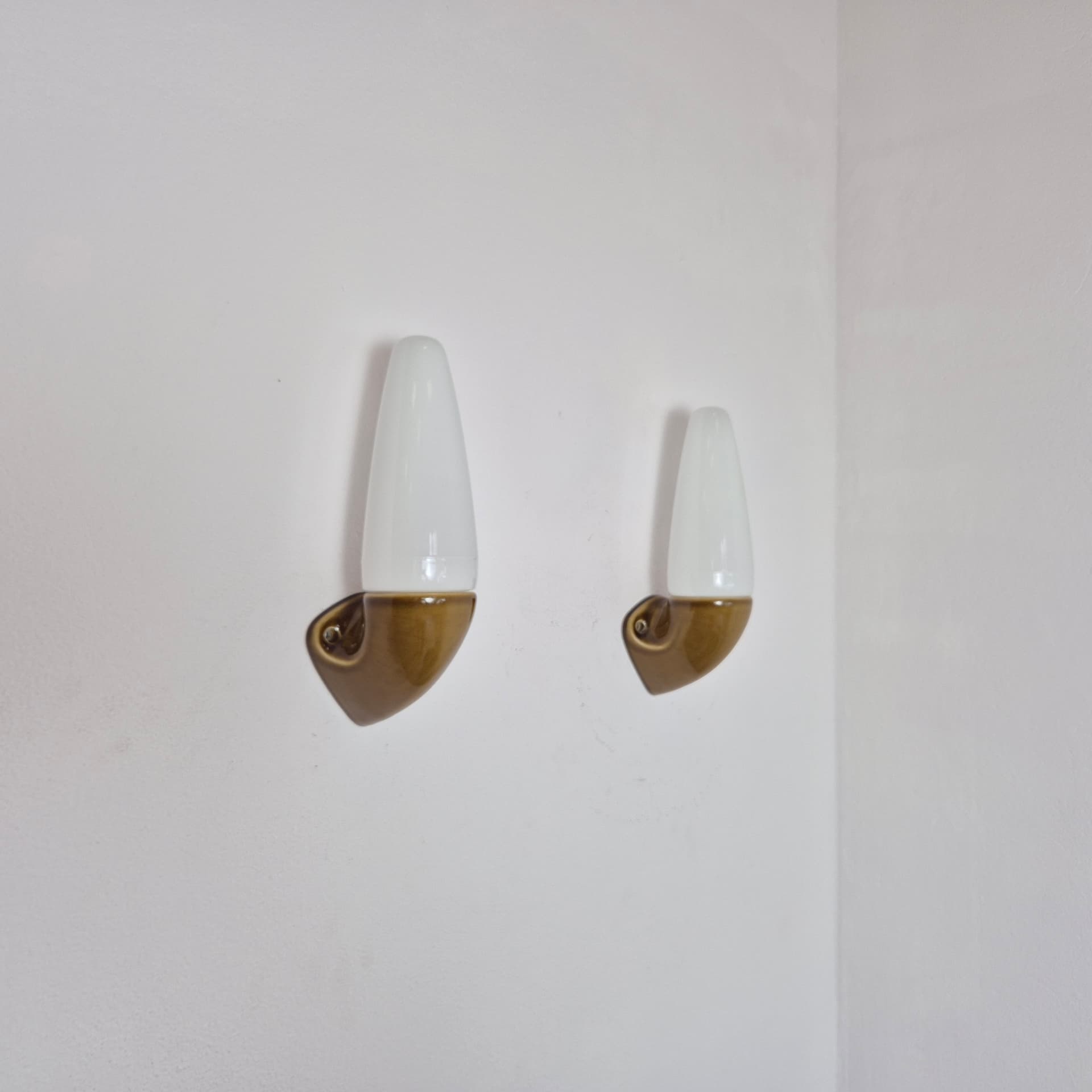 Pair of wall sconces, olive-brown stoneware, white opaline glass, by S. Bernadotte, Sweden, 1970s. - 300112