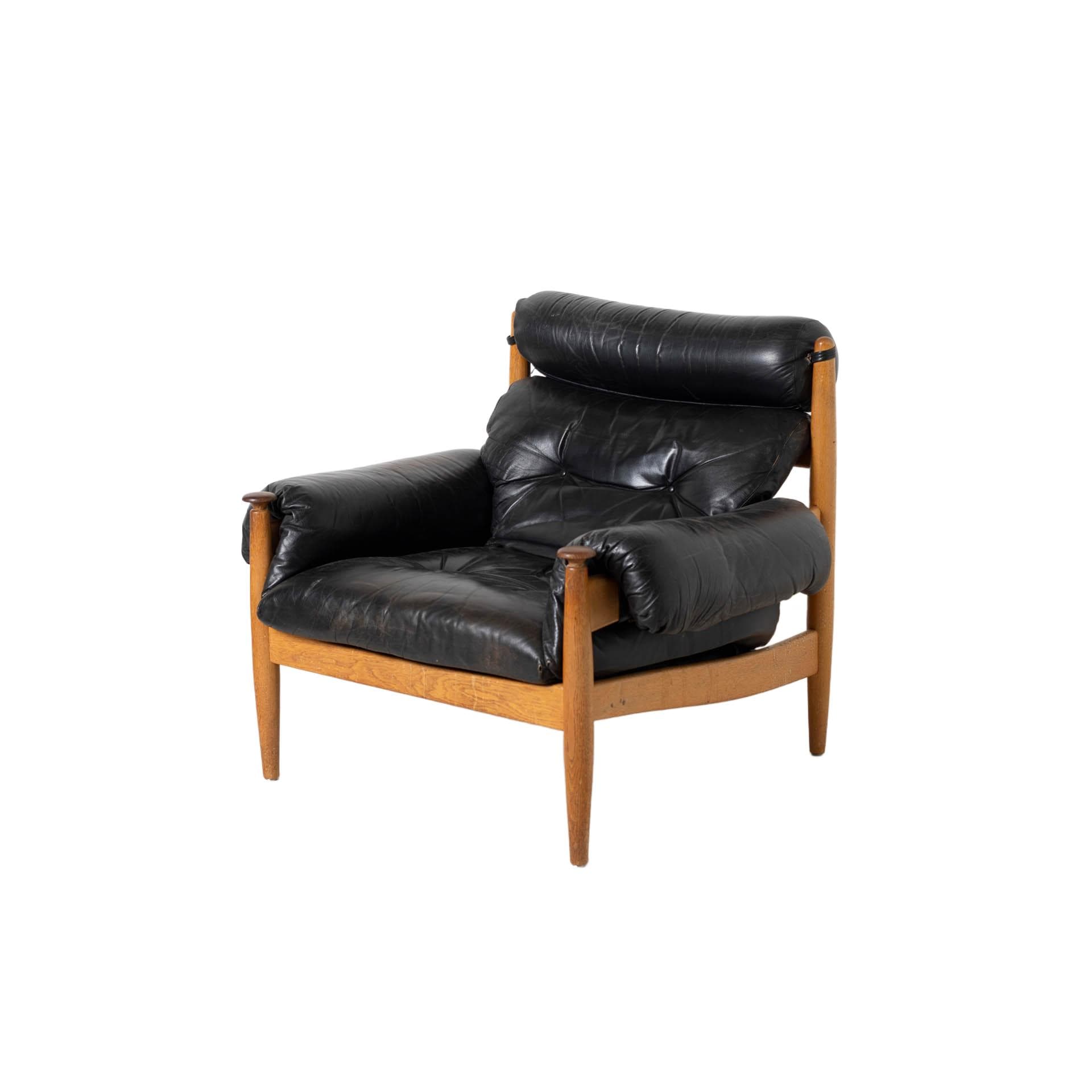 Lounge chair, brown oak, black leather, by E. Merthen, Ire Möbler, Sweden, 1960s.