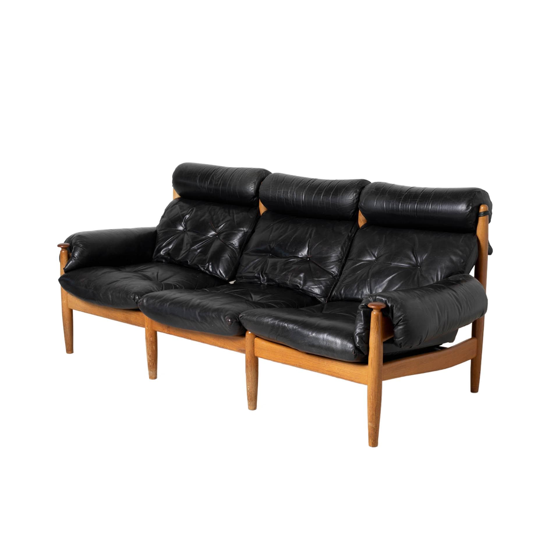 Three-seater sofa, Brazilian style, brown oak, black genuine leather, by E. Merthen, Ire Möbler, Sweden, 1960s.