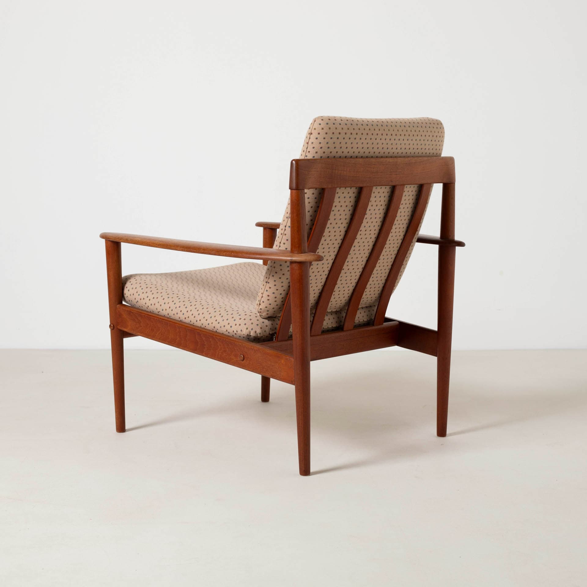 Armchair, brown teak, beige wool, by G. Jalk, Poul Jeppesens Møbelfabrik, Denmark, 1960s. - 300250