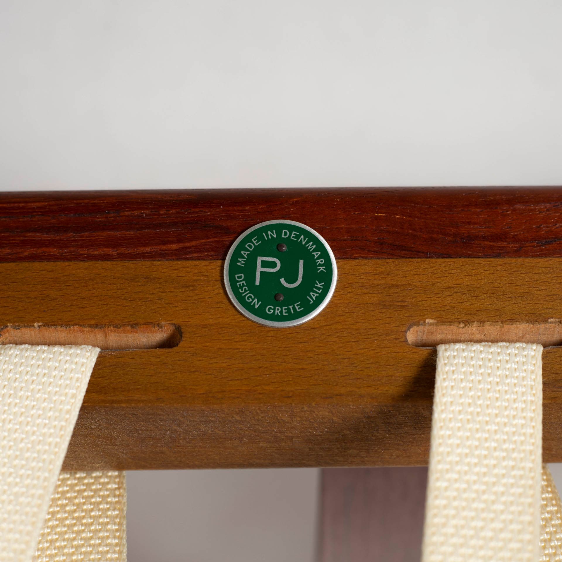 Armchair, brown teak, beige wool, by G. Jalk, Poul Jeppesens Møbelfabrik, Denmark, 1960s. - 300255