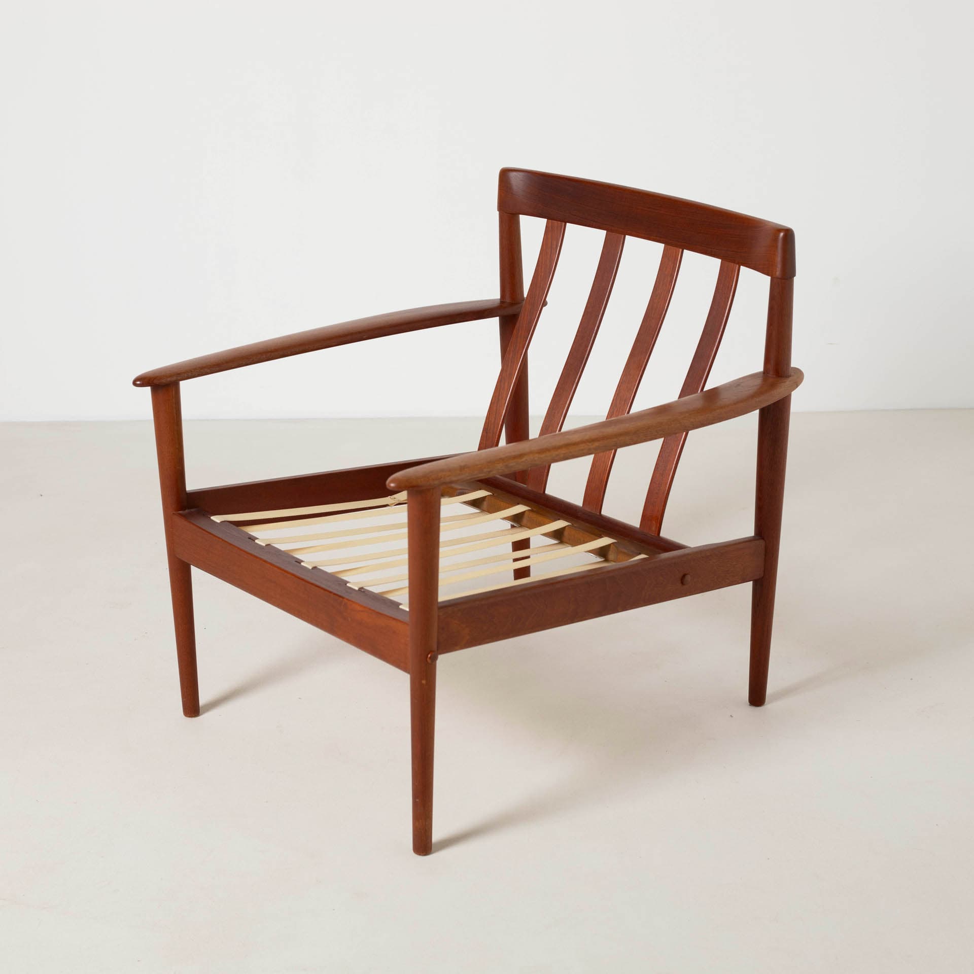 Armchair, brown teak, beige wool, by G. Jalk, Poul Jeppesens Møbelfabrik, Denmark, 1960s. - 300252