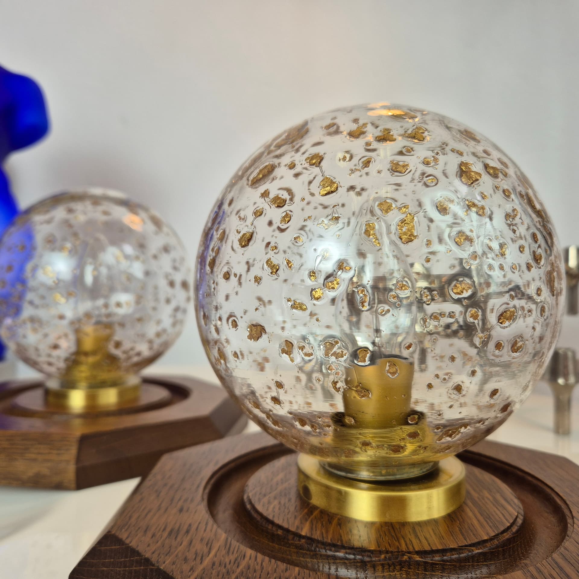 Pair of hexagonal wall sconces, brown wood, transparent glass, gold brass, Temde Leuchten, 1970s. - 300365