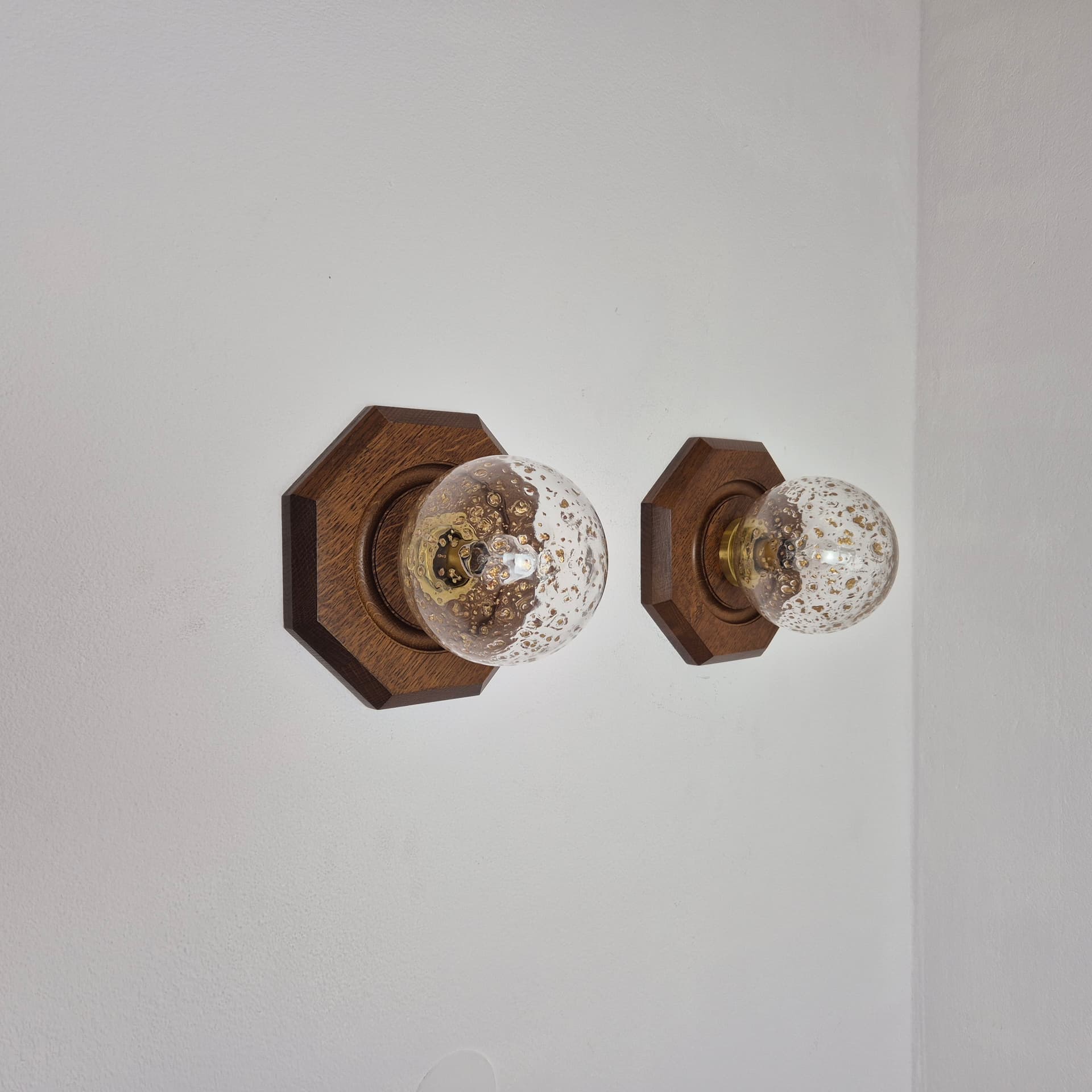 Pair of hexagonal wall sconces, brown wood, transparent glass, gold brass, Temde Leuchten, 1970s. - 300360