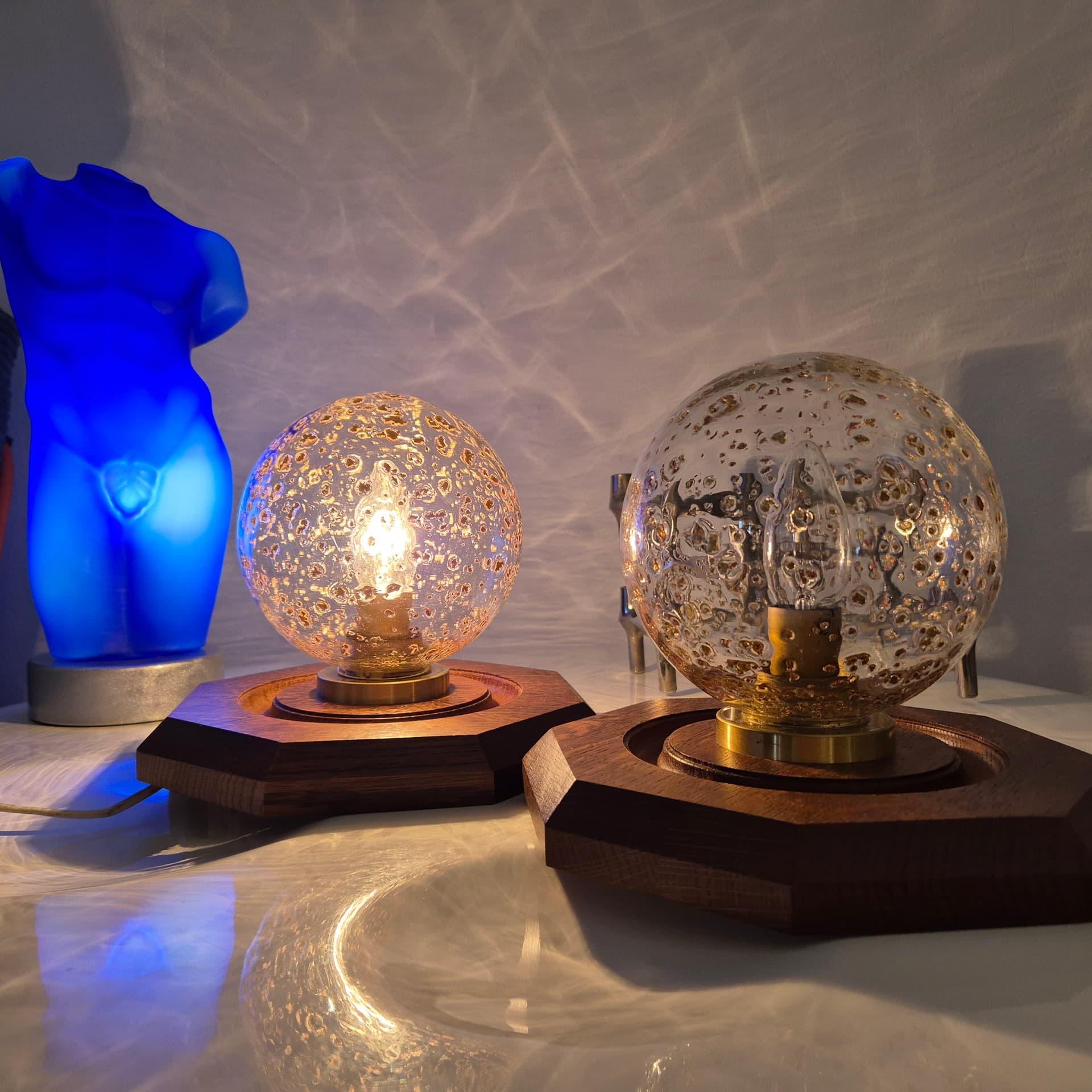 Pair of hexagonal wall sconces, brown wood, transparent glass, gold brass, Temde Leuchten, 1970s. - 300370