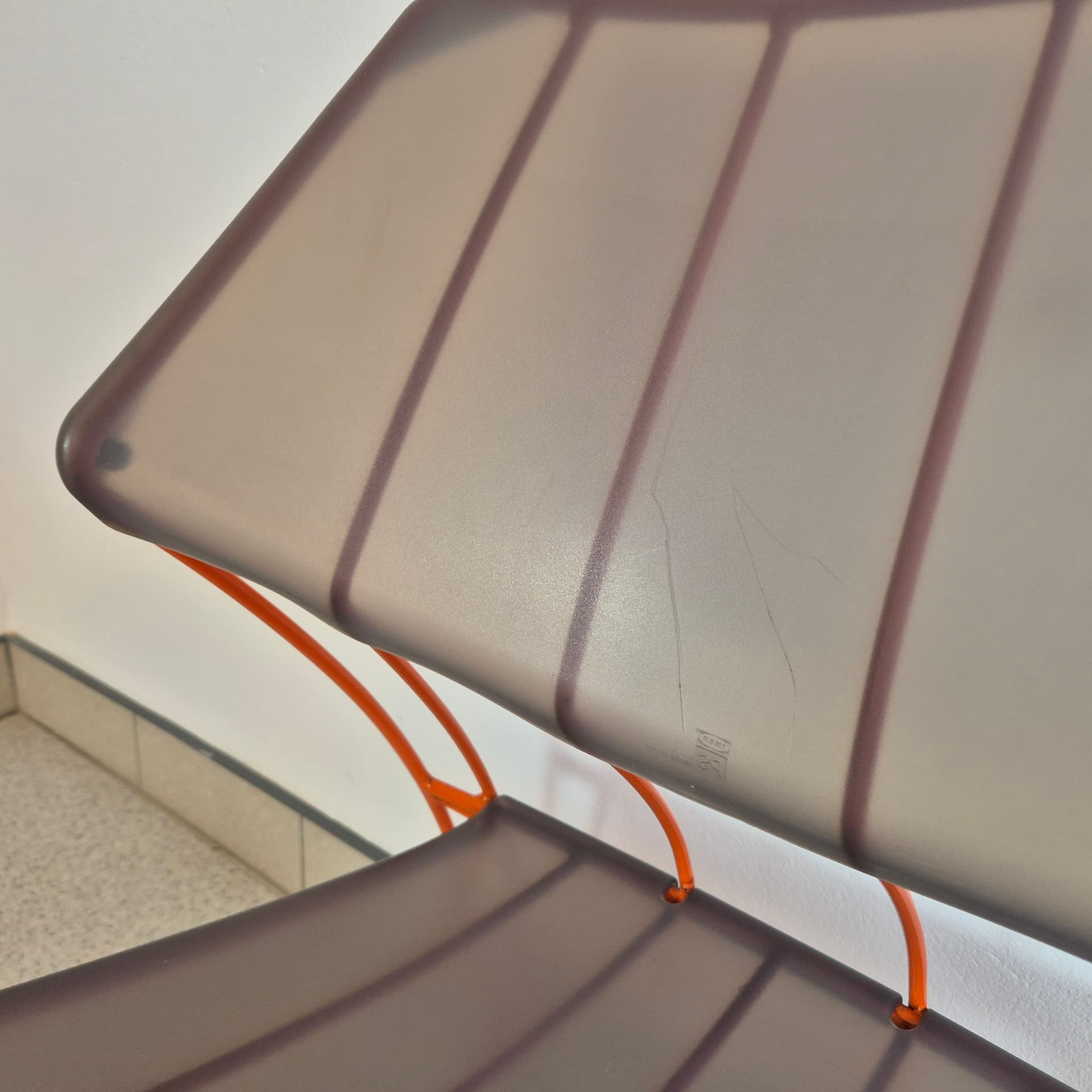 Chair Hasslo, transparent grey plastic, orange metal, by M. Mulder, Ikea, Sweden, 1990s. - 300599