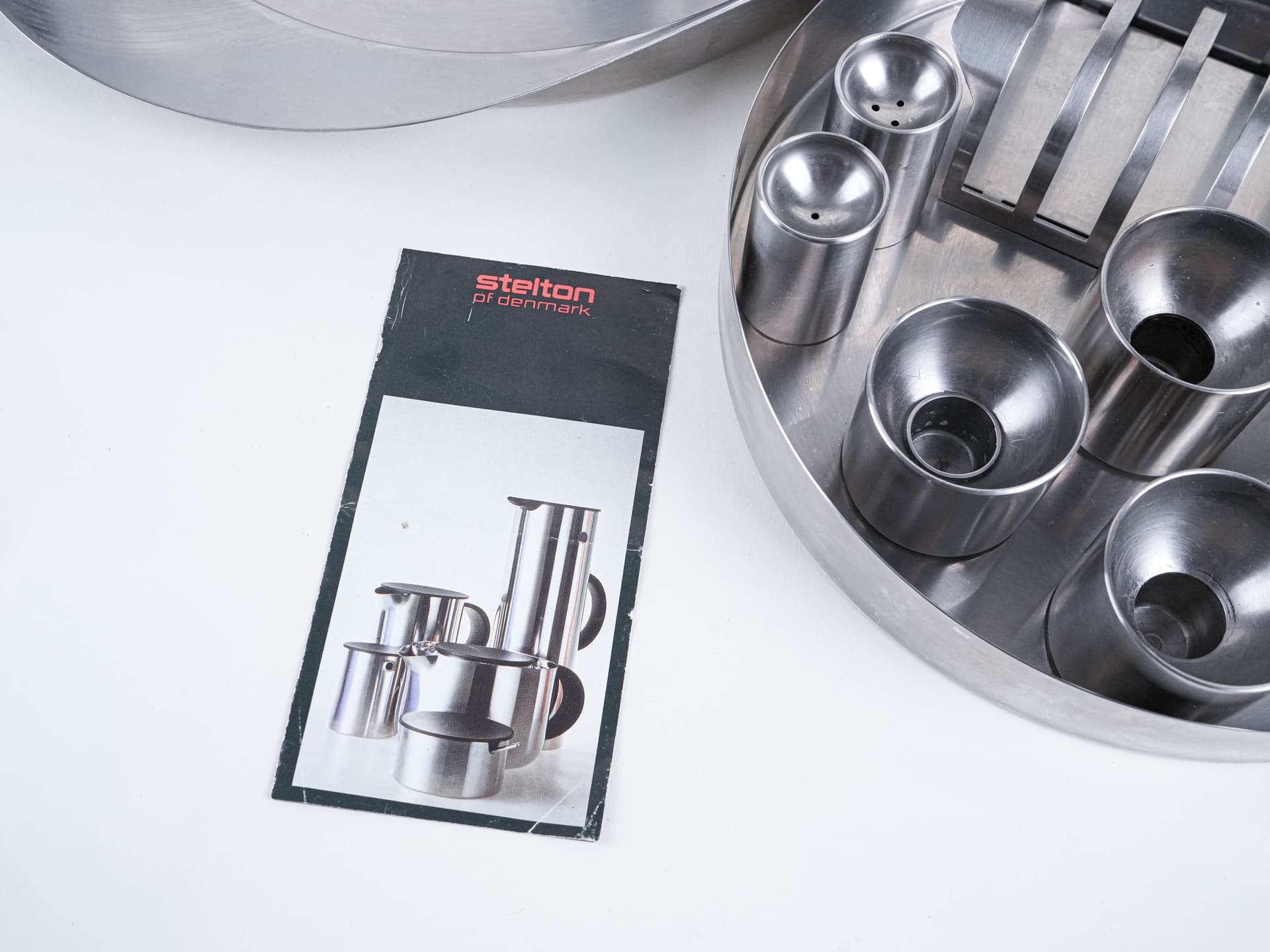 Serving set, silver stainless steel, black plastic, by A. Jacobsen, Denmark, 1960s. - 302320