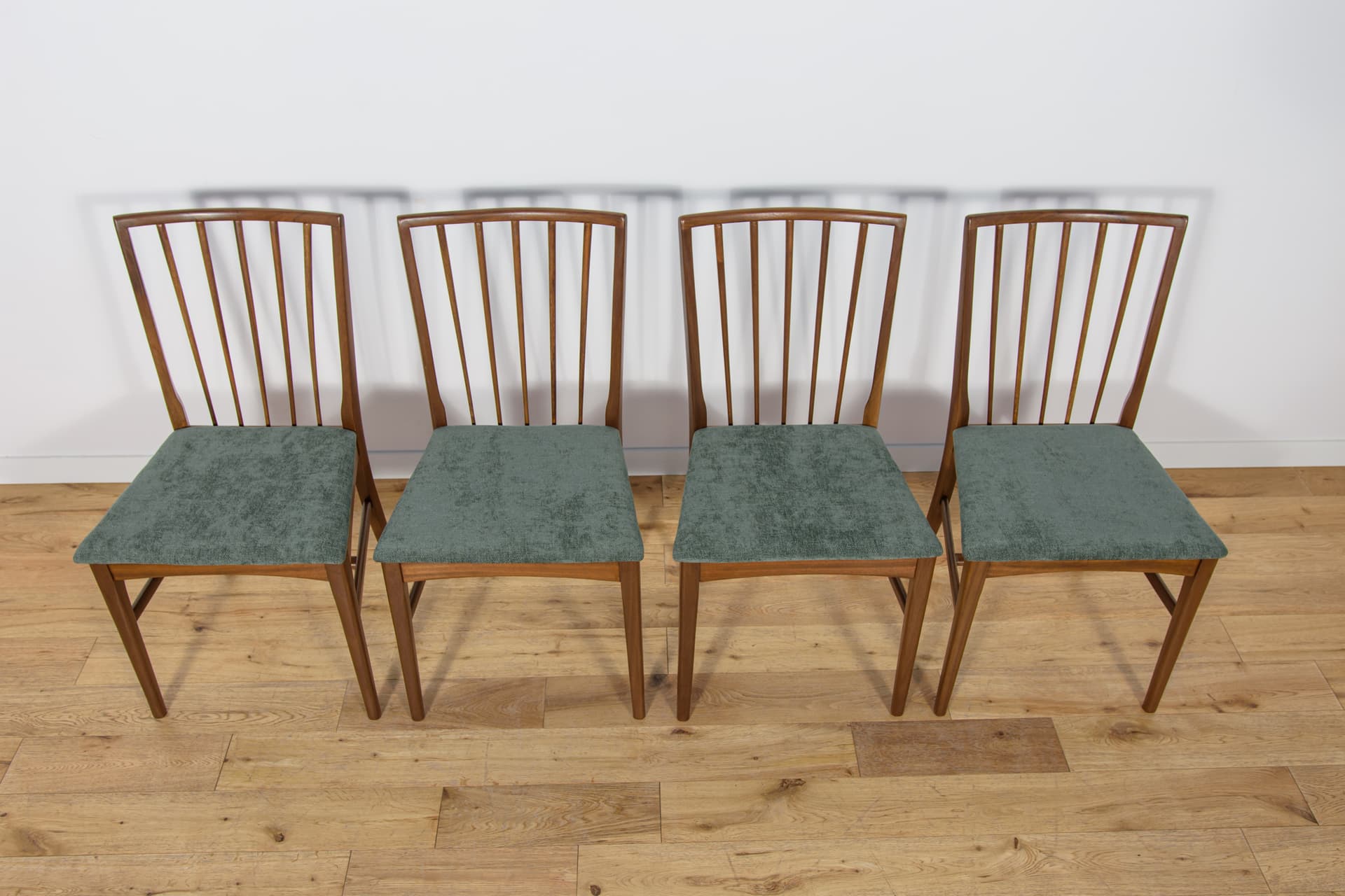 Set of four chairs, brown teak, green fabric, United Kingdom, 1960s. - 302877