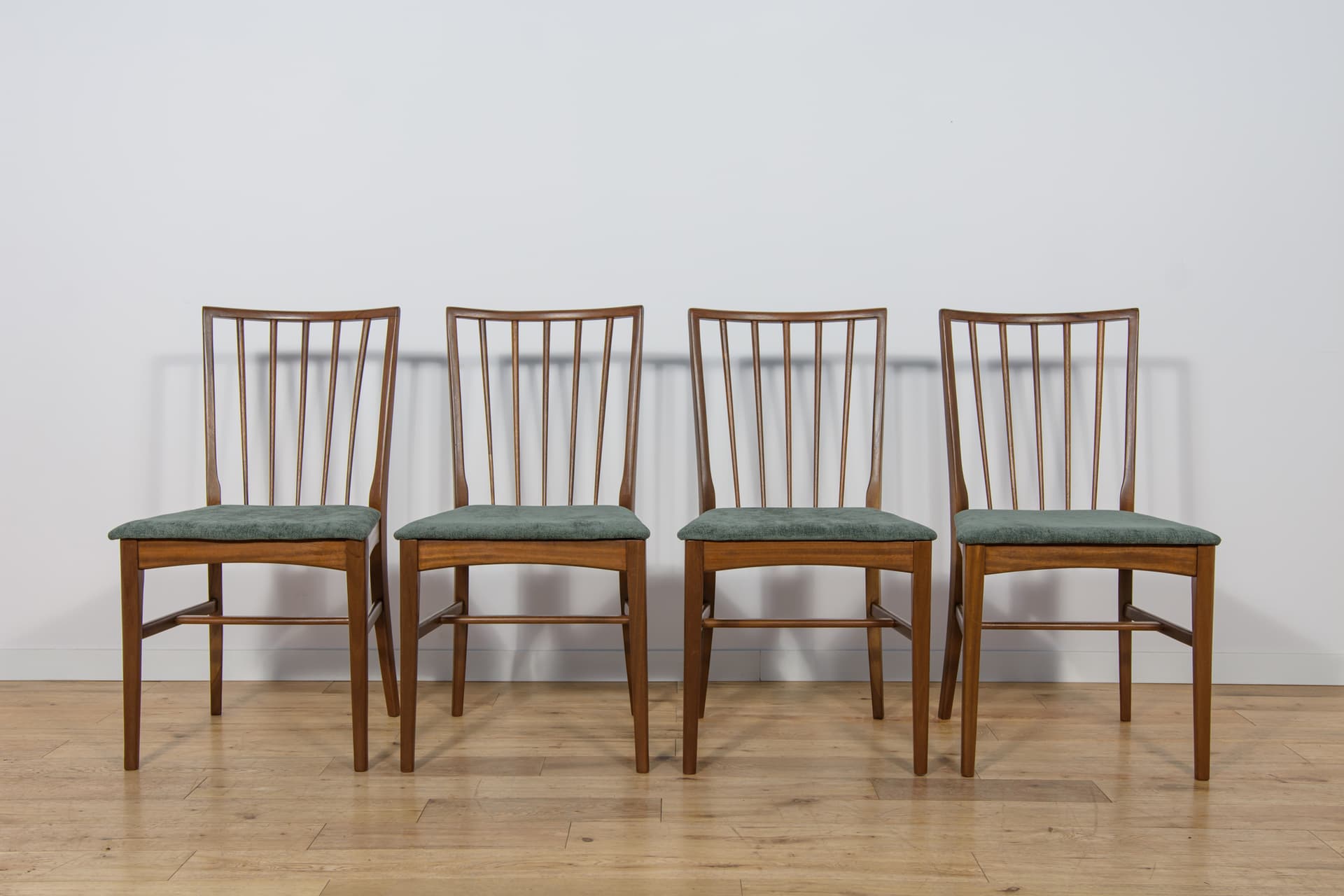 Set of four chairs, brown teak, green fabric, United Kingdom, 1960s. - 302876