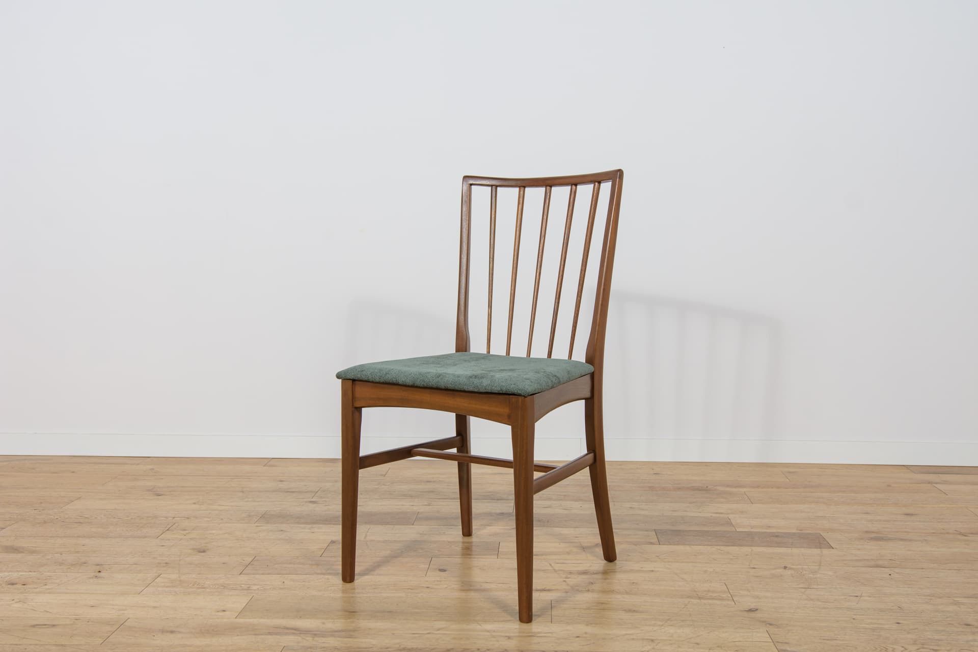 Set of four chairs, brown teak, green fabric, United Kingdom, 1960s. - 302880