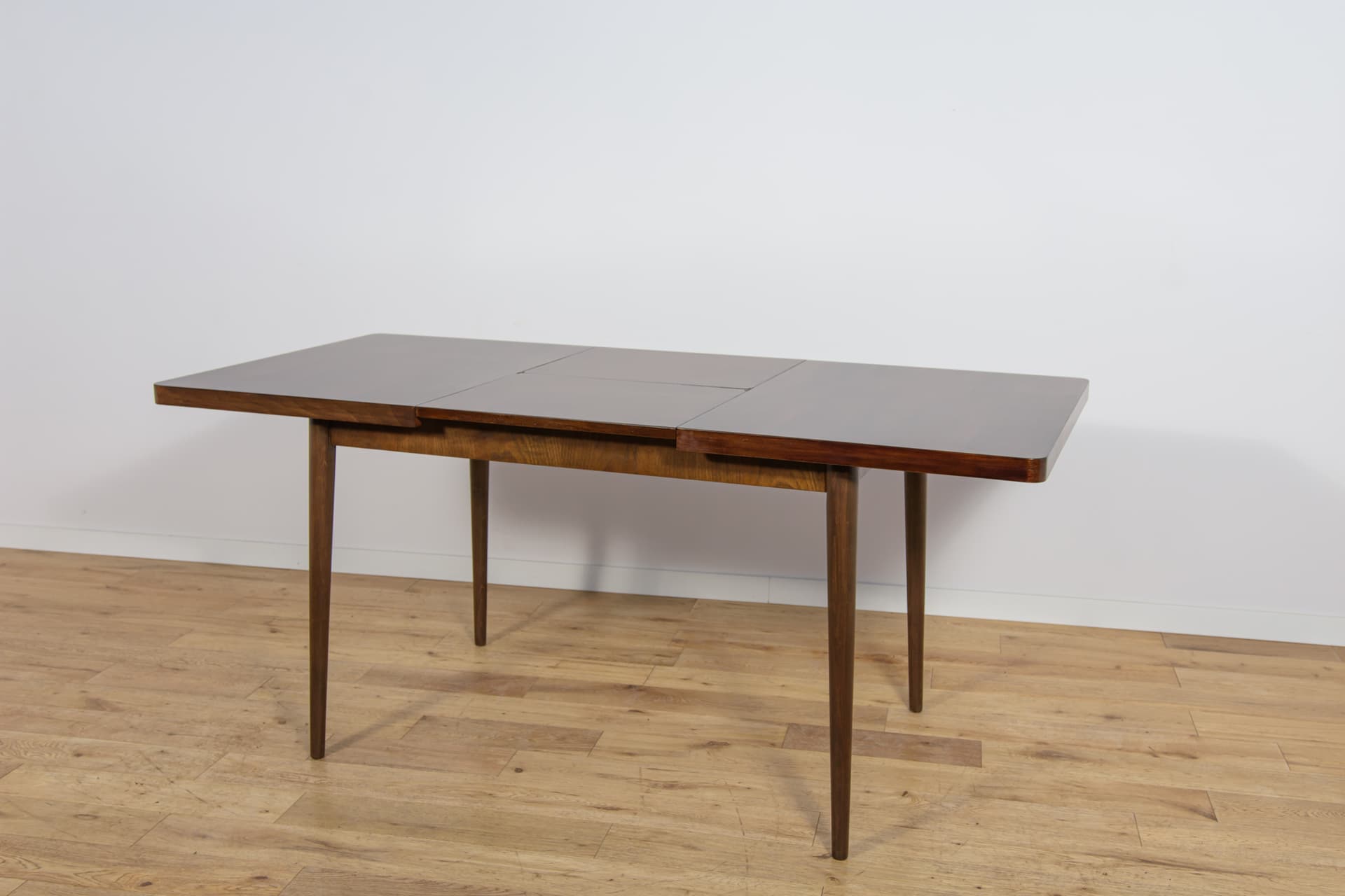 Extendable table, brown walnut, beech, by B. Landsman, H. Nepozitek, Jitona, Czechoslovakia, 1960s. - 304507