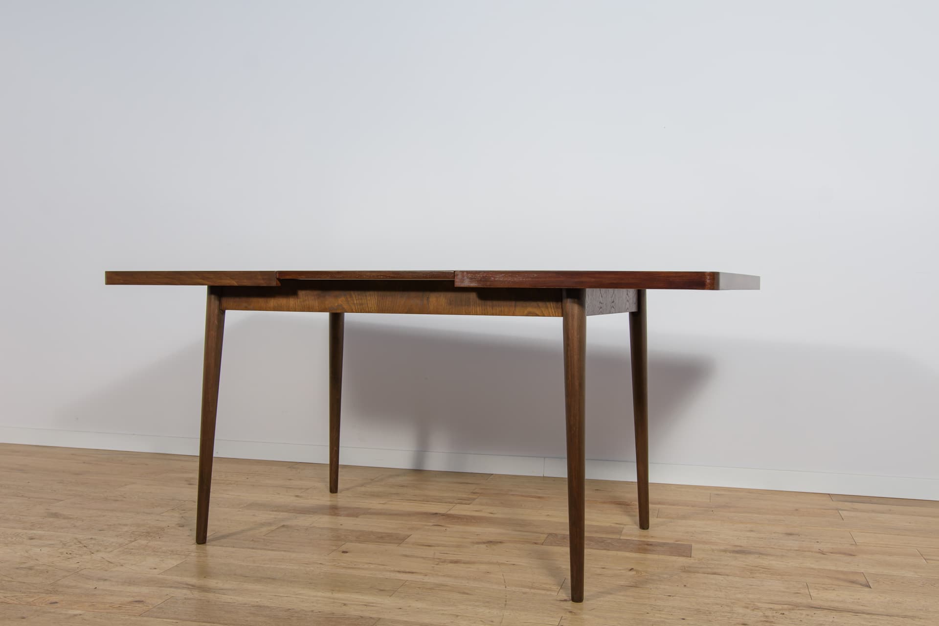 Extendable table, brown walnut, beech, by B. Landsman, H. Nepozitek, Jitona, Czechoslovakia, 1960s. - 304508