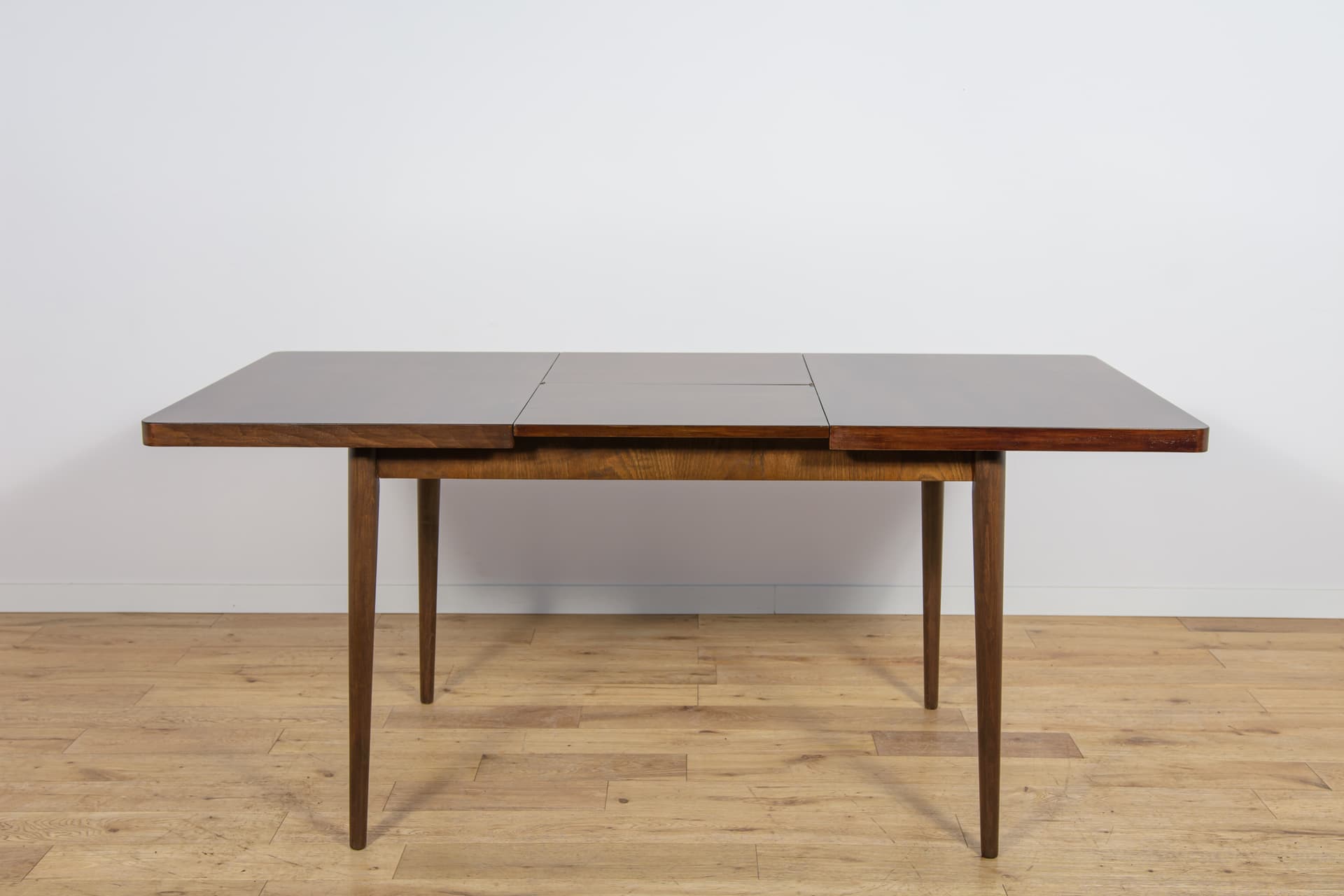 Extendable table, brown walnut, beech, by B. Landsman, H. Nepozitek, Jitona, Czechoslovakia, 1960s. - 304505