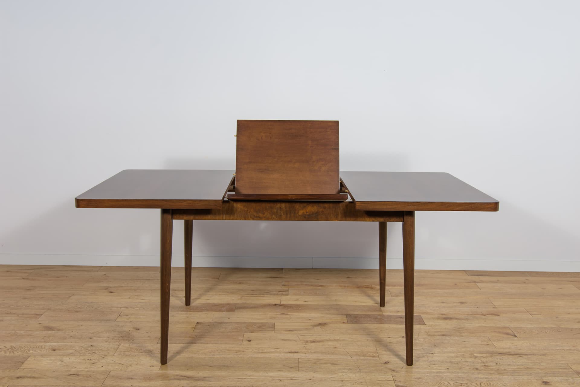 Extendable table, brown walnut, beech, by B. Landsman, H. Nepozitek, Jitona, Czechoslovakia, 1960s. - 304504
