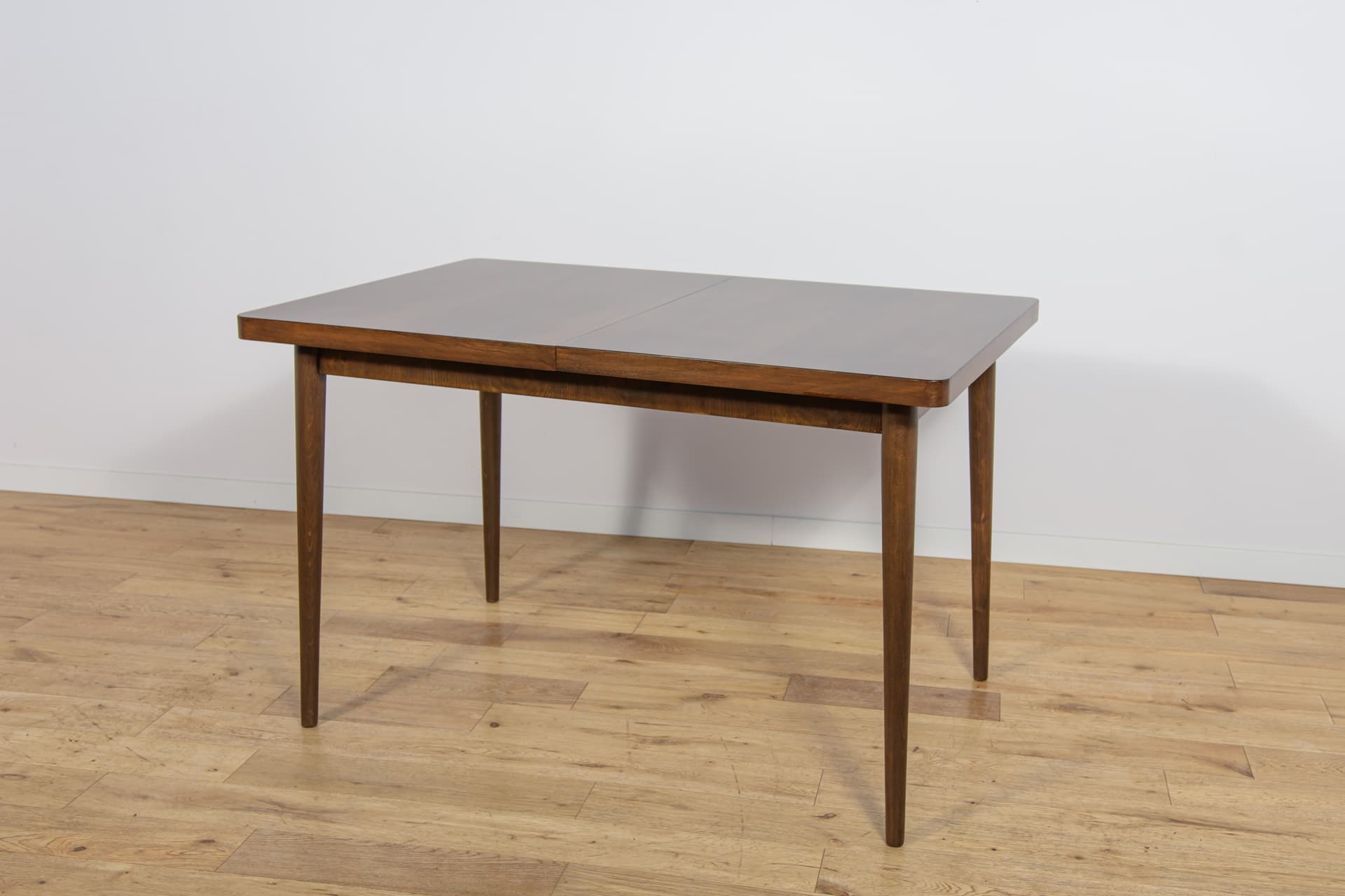 Extendable table, brown walnut, beech, by B. Landsman, H. Nepozitek, Jitona, Czechoslovakia, 1960s. - 304499