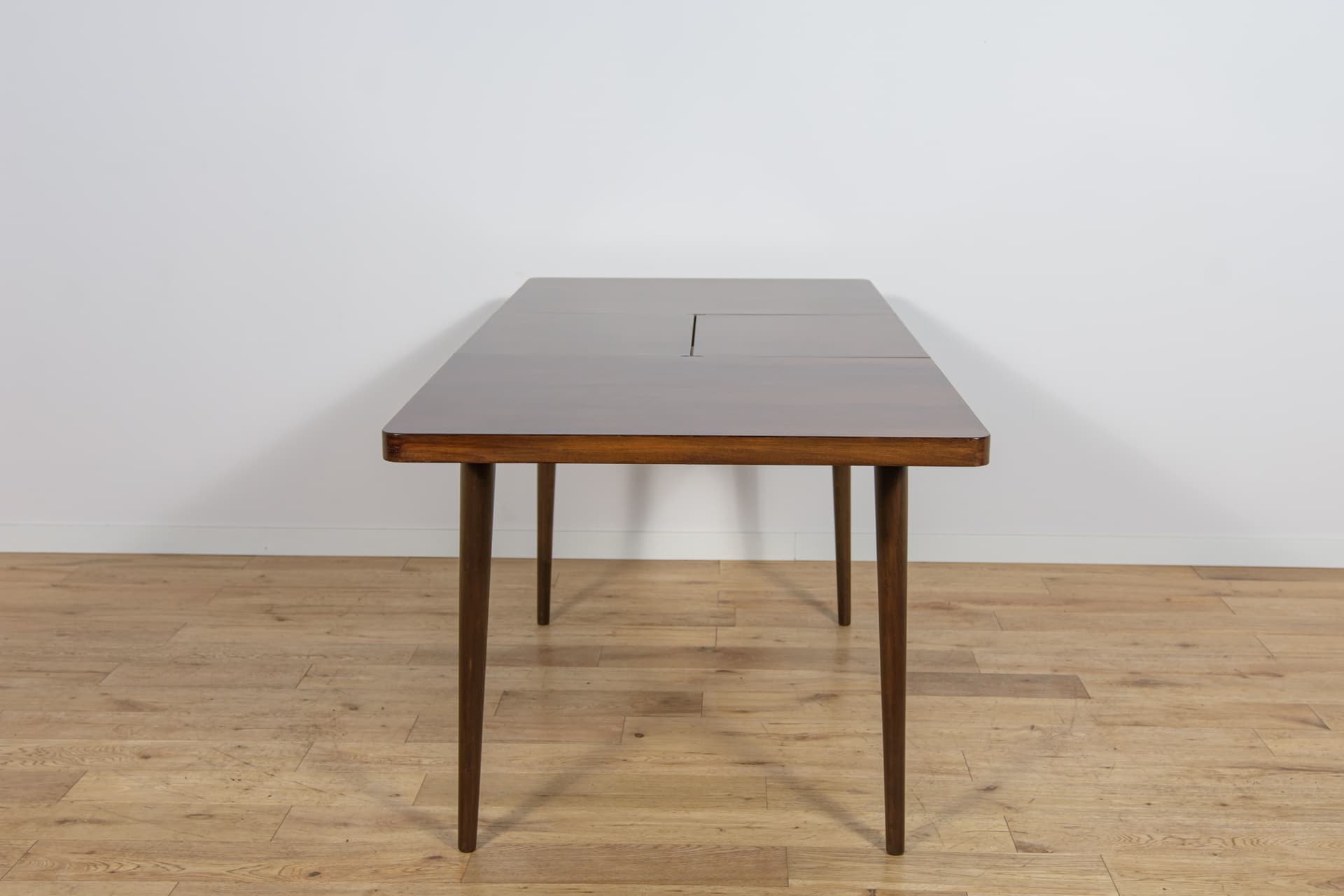 Extendable table, brown walnut, beech, by B. Landsman, H. Nepozitek, Jitona, Czechoslovakia, 1960s. - 304509