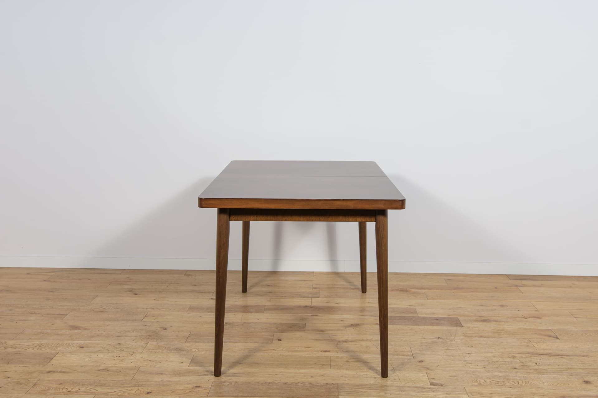 Extendable table, brown walnut, beech, by B. Landsman, H. Nepozitek, Jitona, Czechoslovakia, 1960s. - 304503