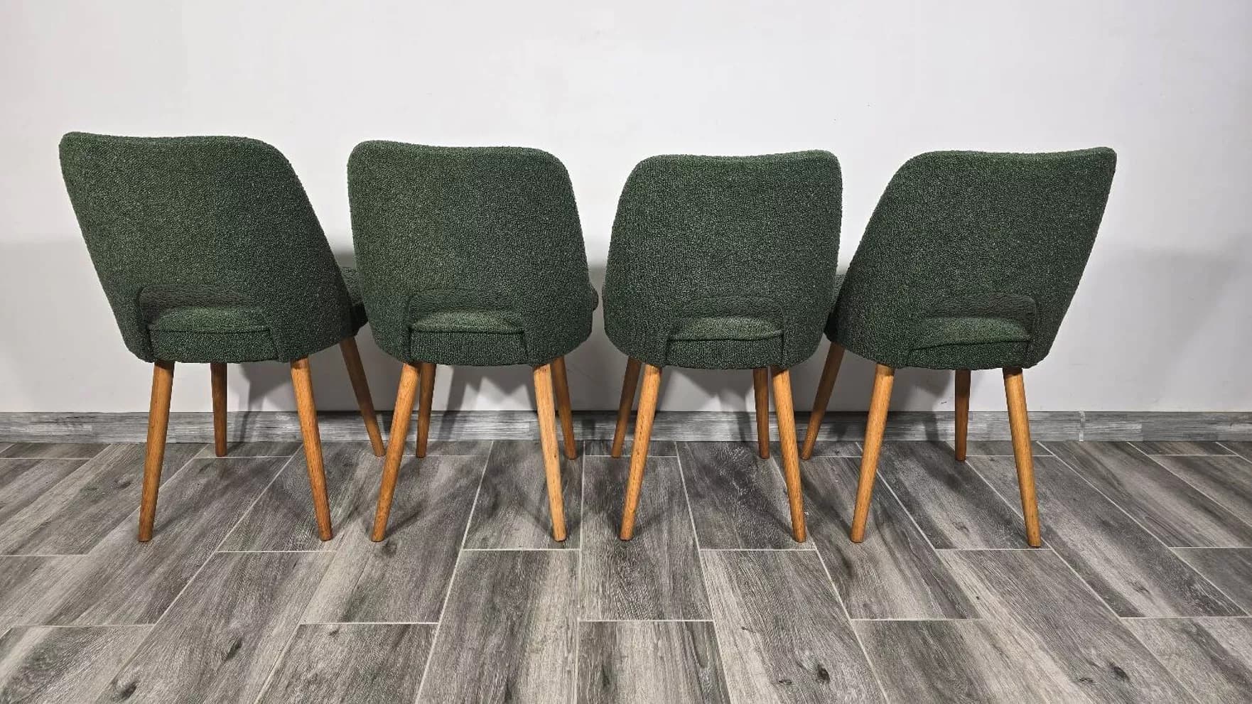 Set of four chairs, green bouclé, oak, by O. Haerdtl, Tatra Nabytok, Czechoslovakia, 1960s. - 305719