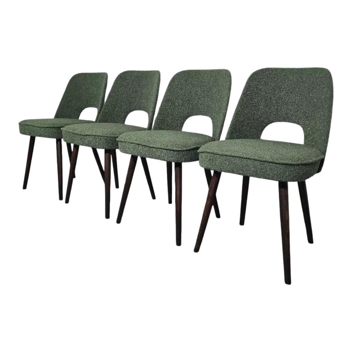 Set of four chairs, green bouclé, brown oak, by O. Haerdtl, Tatra Nabytok, Czechoslovakia, 1960s.