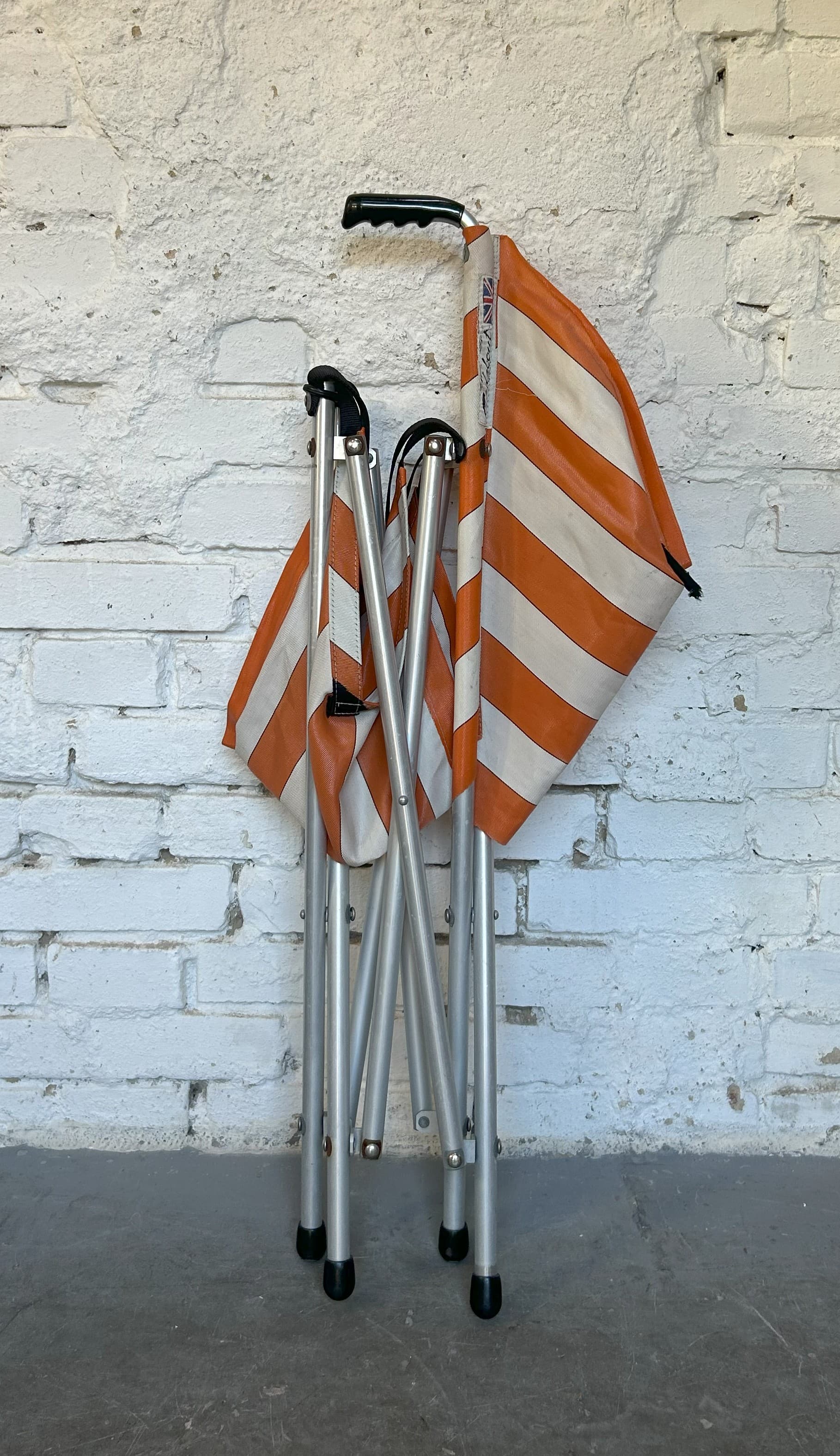 Folding chair Gadabout, orange and off-white canvas, silver aluminium, United Kingdom, 1960s. - 305803