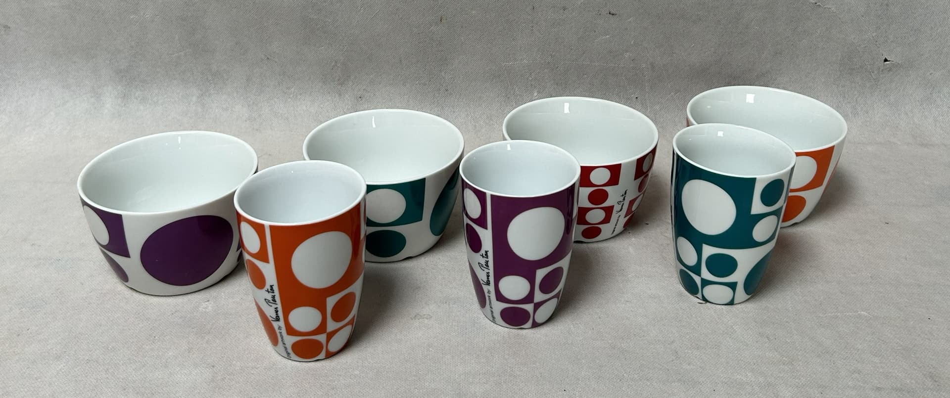 Set of mugs and bowls Geometri 1, white porcelain with purple, orange, blue, red decoration, by V. Panton, Denmark, 1960s. - 306505