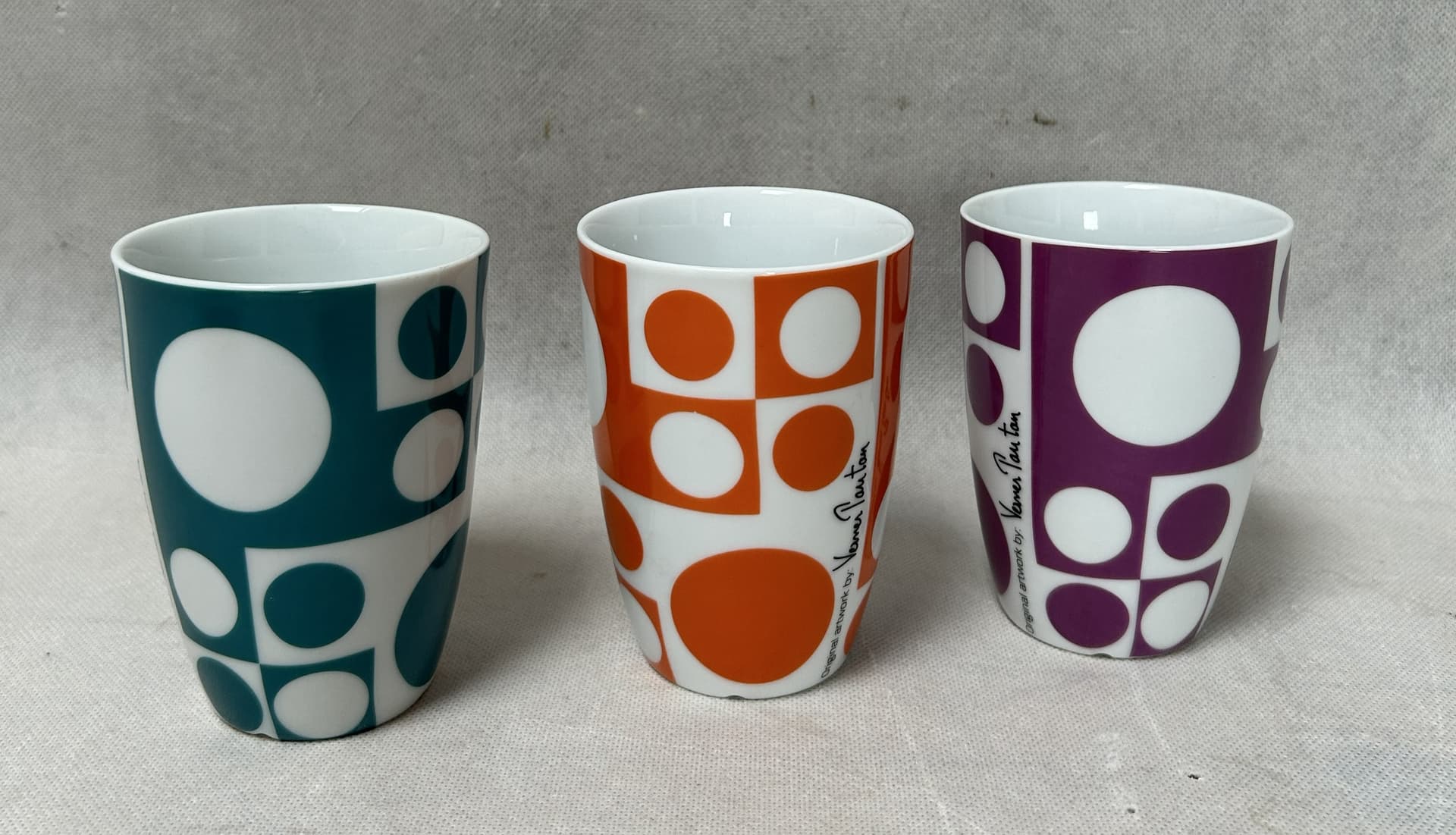 Set of mugs and bowls Geometri 1, white porcelain with purple, orange, blue, red decoration, by V. Panton, Denmark, 1960s. - 306499