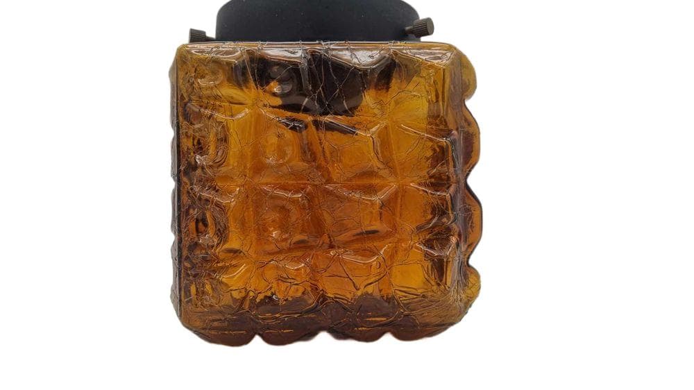 Lampa wisząca, bursztynowe szkło, metal czarny, Polska, lata 70.