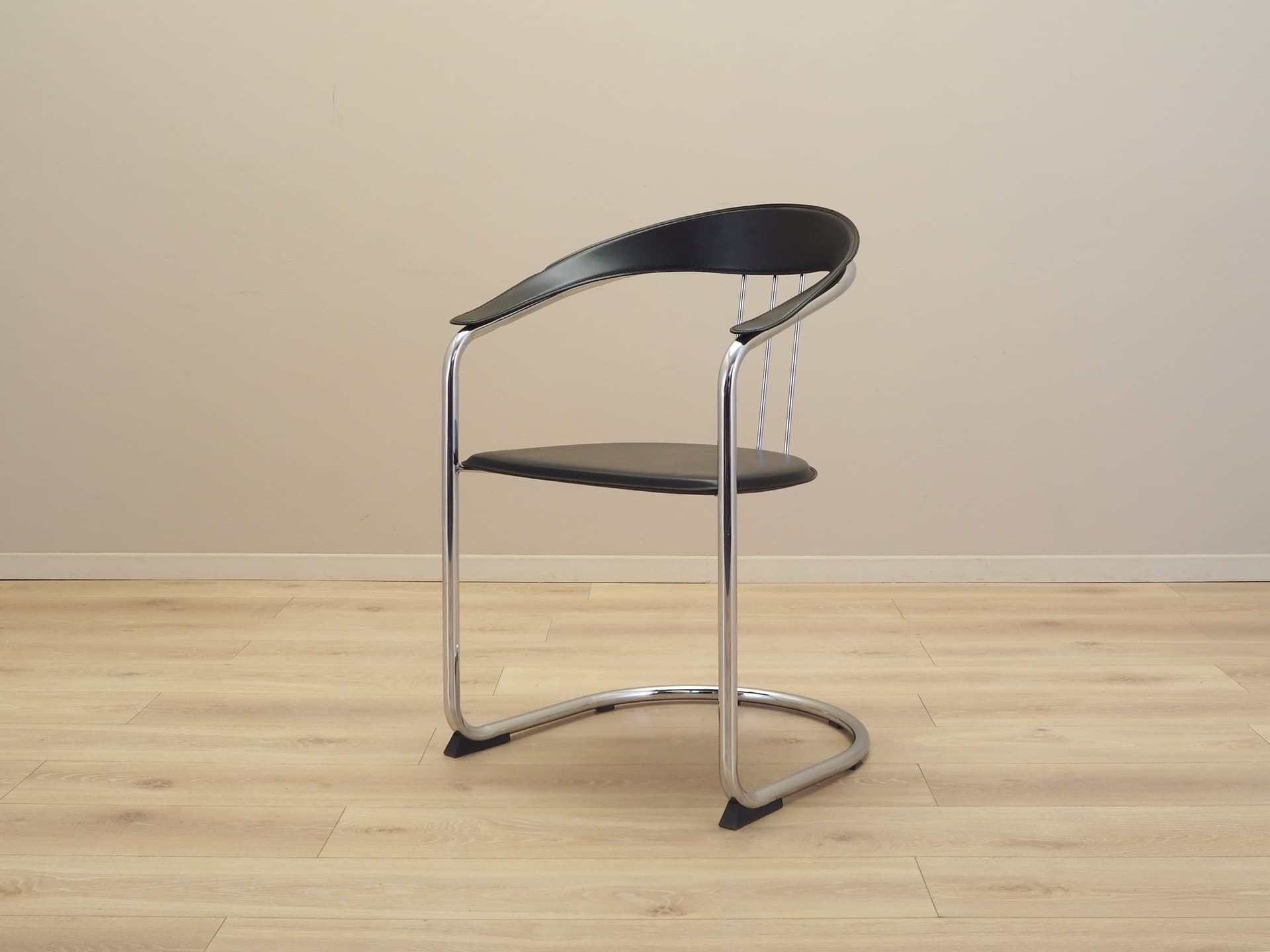 Set of four chairs, black leather, chromed metal, Italy, 1980s. - 66525