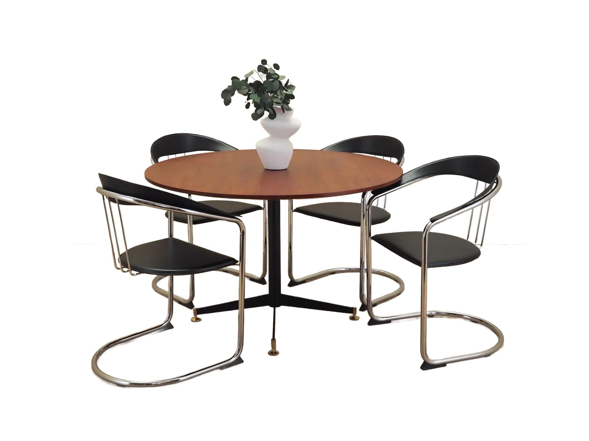 Set of four chairs, black leather, chromed metal, Italy, 1980s. - 22659