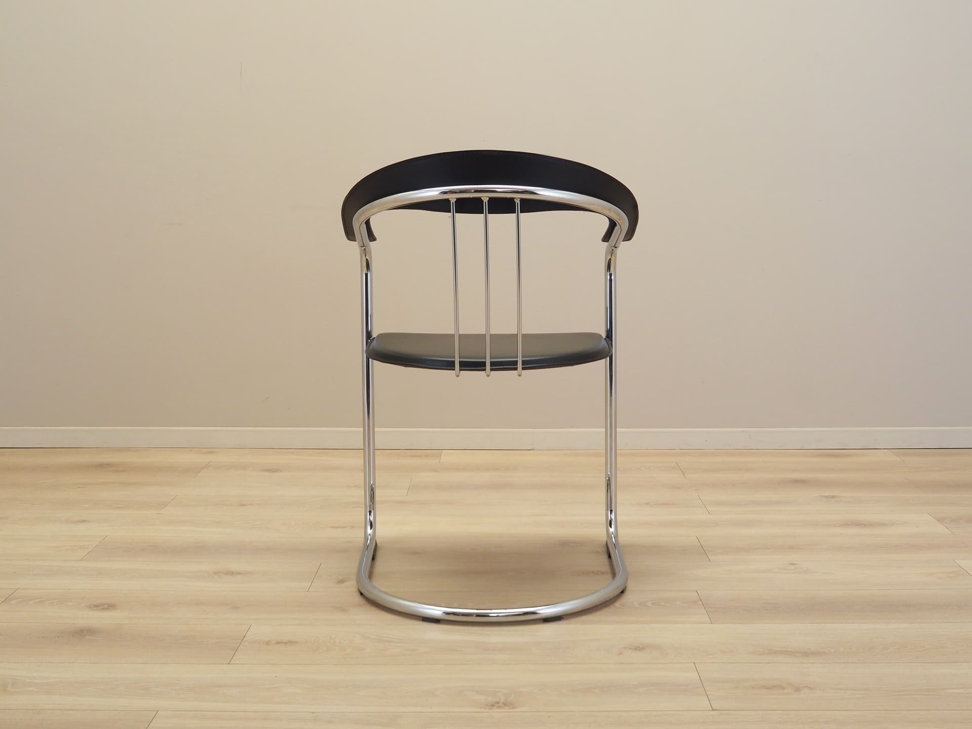 Set of four chairs, black leather, chromed metal, Italy, 1980s. - 66527