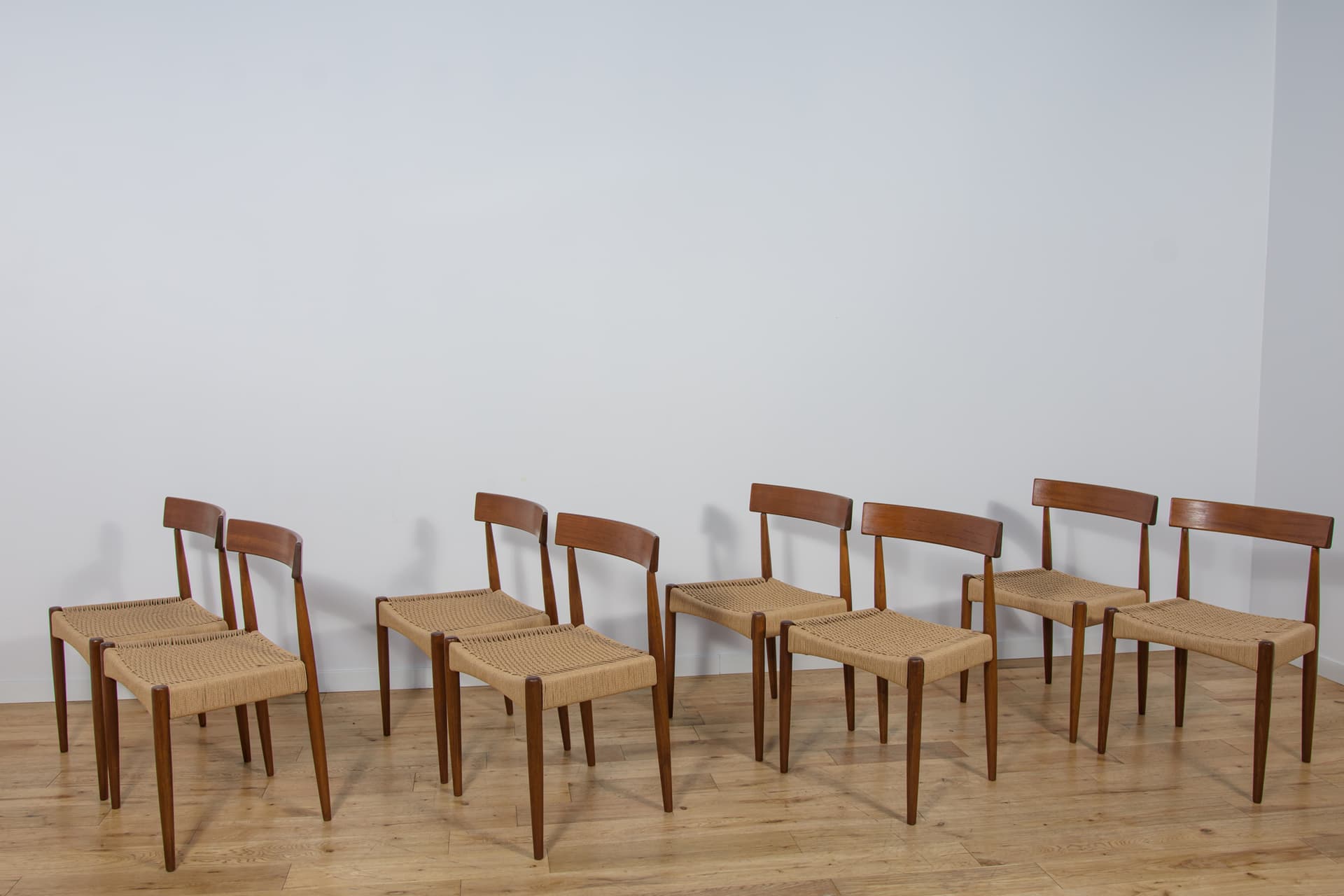 Set of eight chairs, brown teak, beige rattan, by A. Hovmand-Olsen, for Mogens Hansen, Denmark, 1960s. - 307708