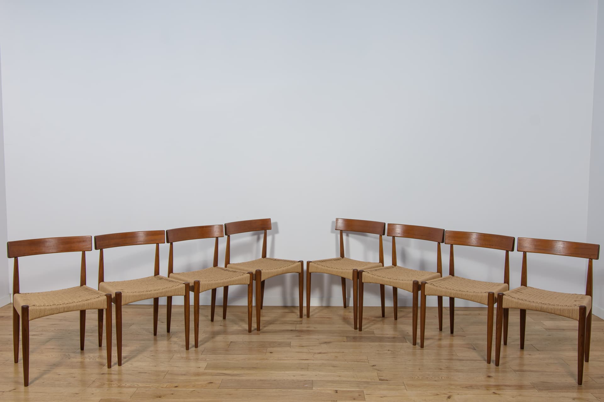 Set of eight chairs, brown teak, beige rattan, by A. Hovmand-Olsen, for Mogens Hansen, Denmark, 1960s. - 307711