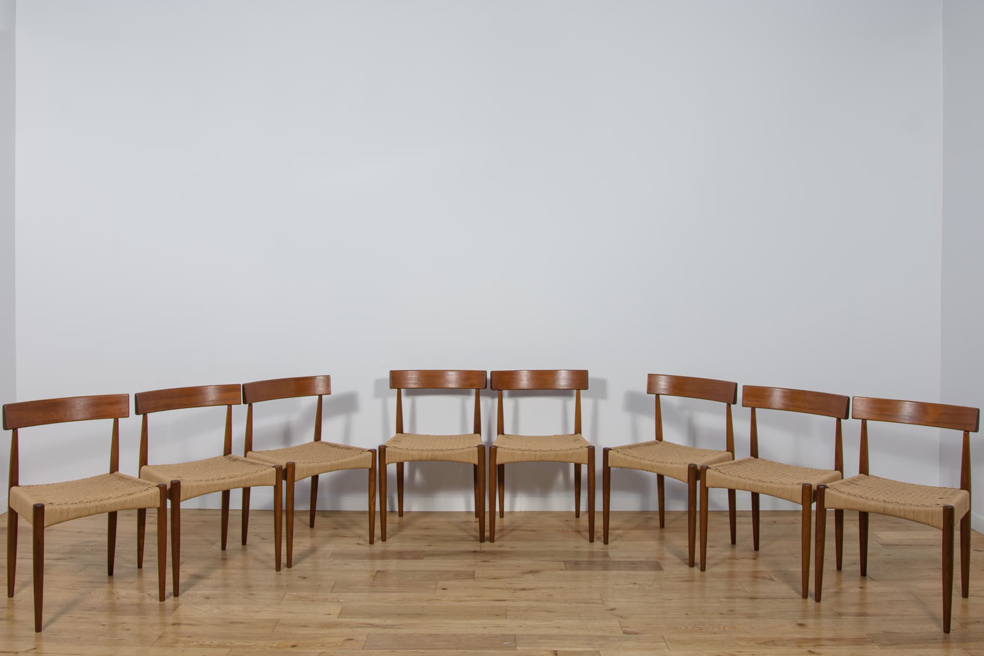 Set of eight chairs, brown teak, beige rattan, by A. Hovmand-Olsen, for Mogens Hansen, Denmark, 1960s. - 307707