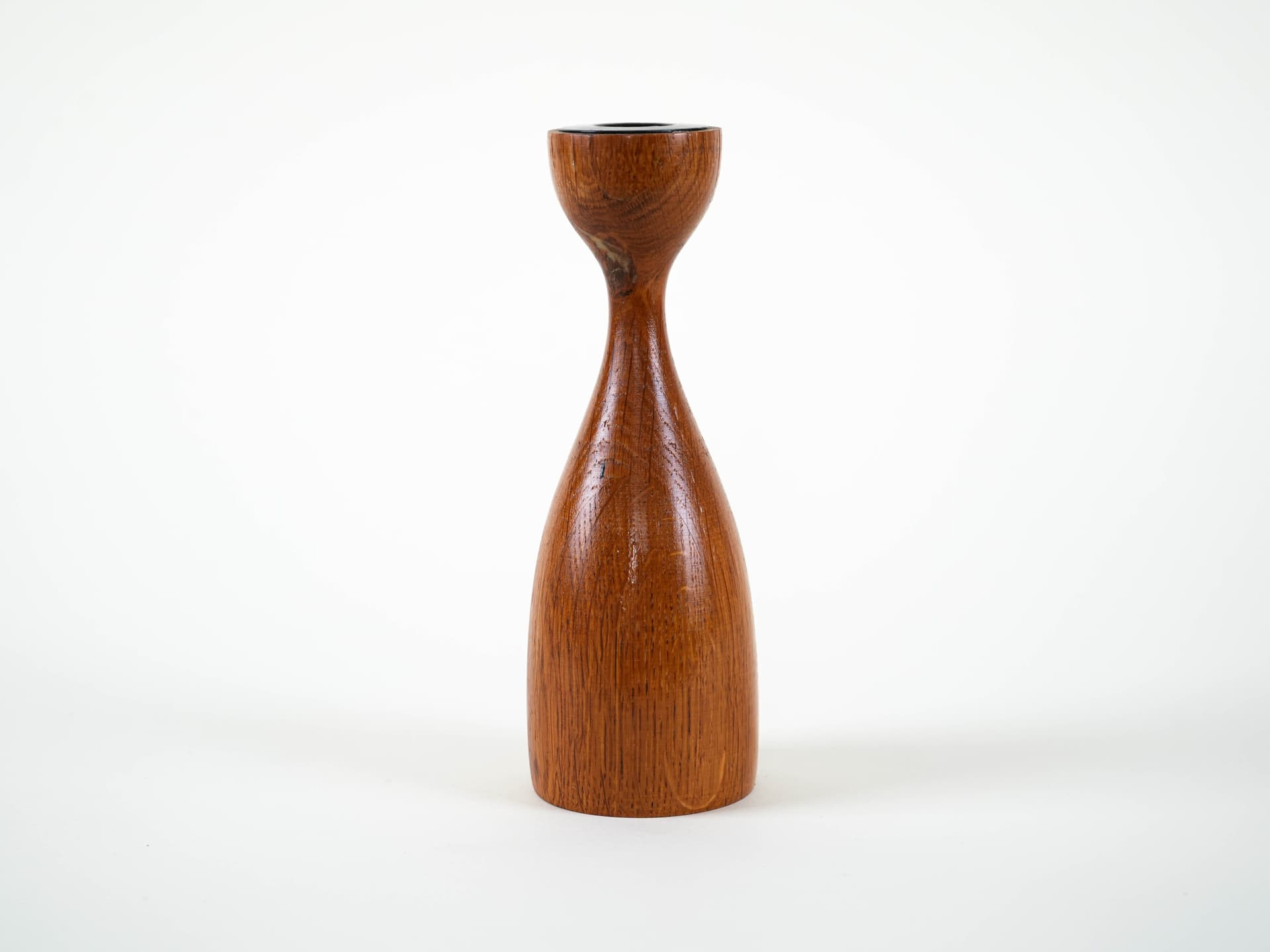 Candlestick, brown teak, black metal, Denmark, 1970s. - 313499
