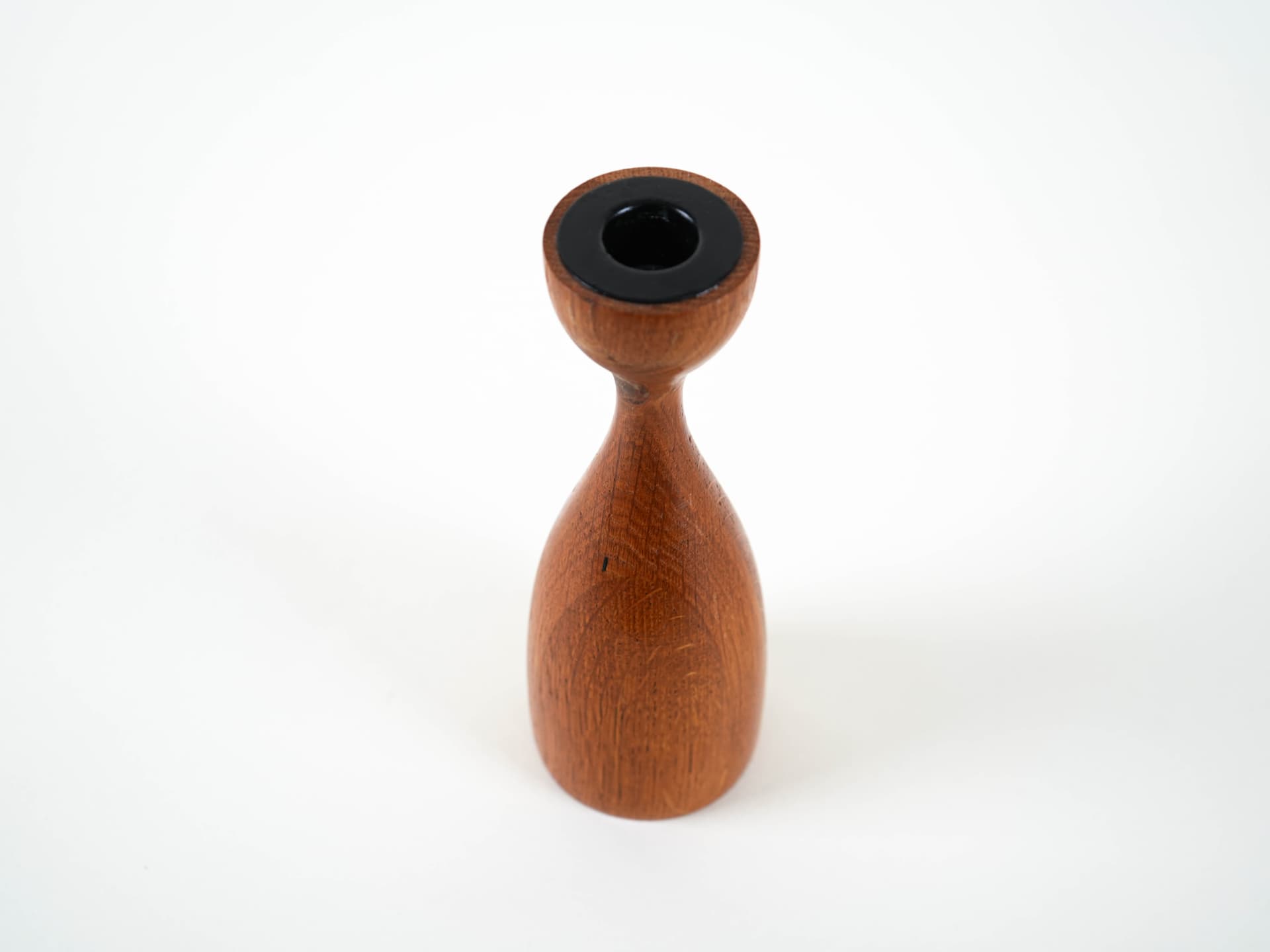 Candlestick, brown teak, black metal, Denmark, 1970s. - 313498