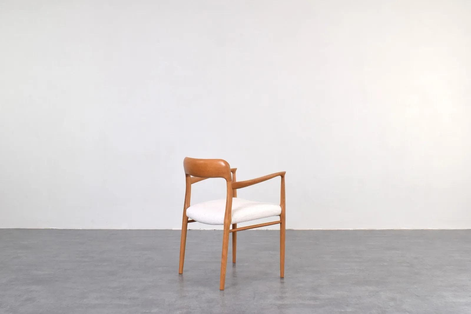 Armchair, brown oak, white fabric, by N. O. Møller, J.L. Møllers, Denmark, 1950s - 316179
