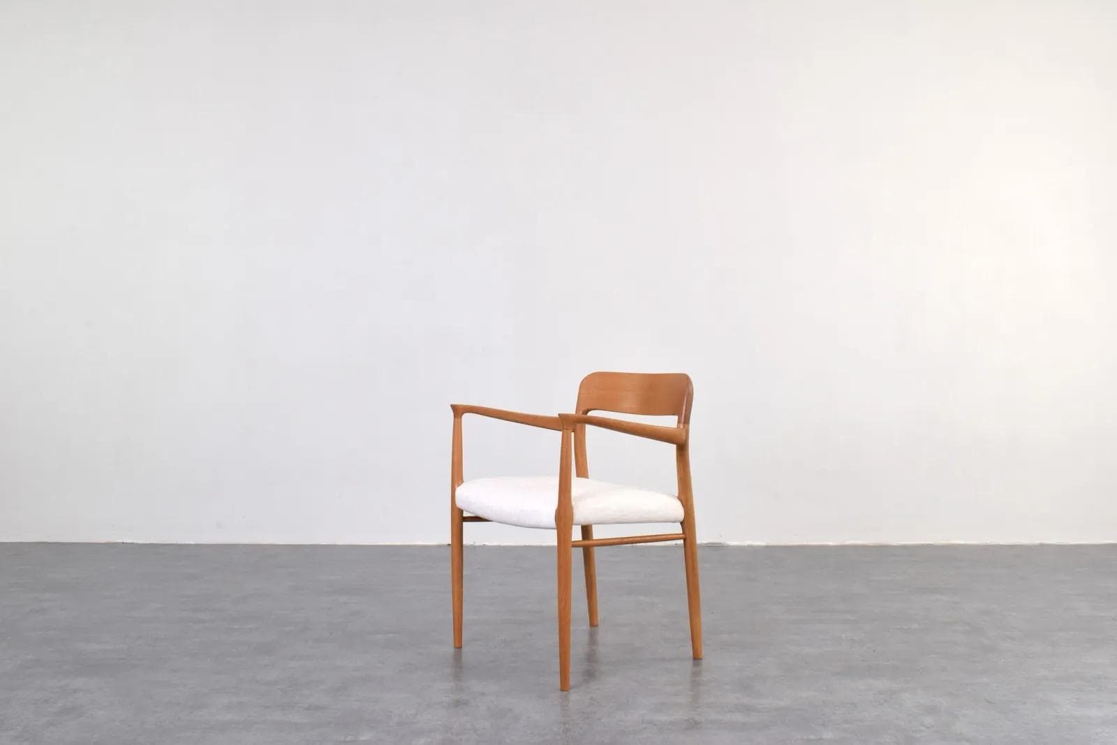 Armchair, brown oak, white fabric, by N. O. Møller, J.L. Møllers, Denmark, 1950s - 316177