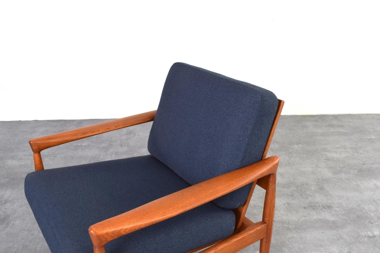 Pair of armchairs, brown oak, navy blue fabric, by E. Wørts, Ikea, Sweden, 1960s. - 315742