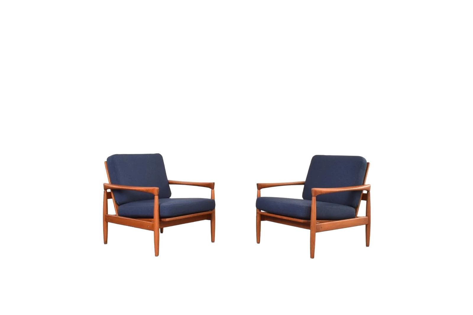 Pair of armchairs, brown oak, navy blue fabric, by E. Wørts, Ikea, Sweden, 1960s.