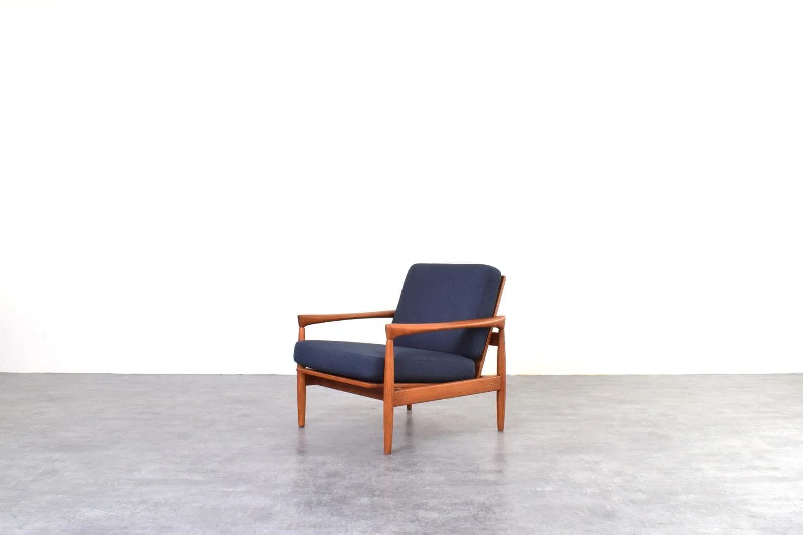 Pair of armchairs, brown oak, navy blue fabric, by E. Wørts, Ikea, Sweden, 1960s. - 315741