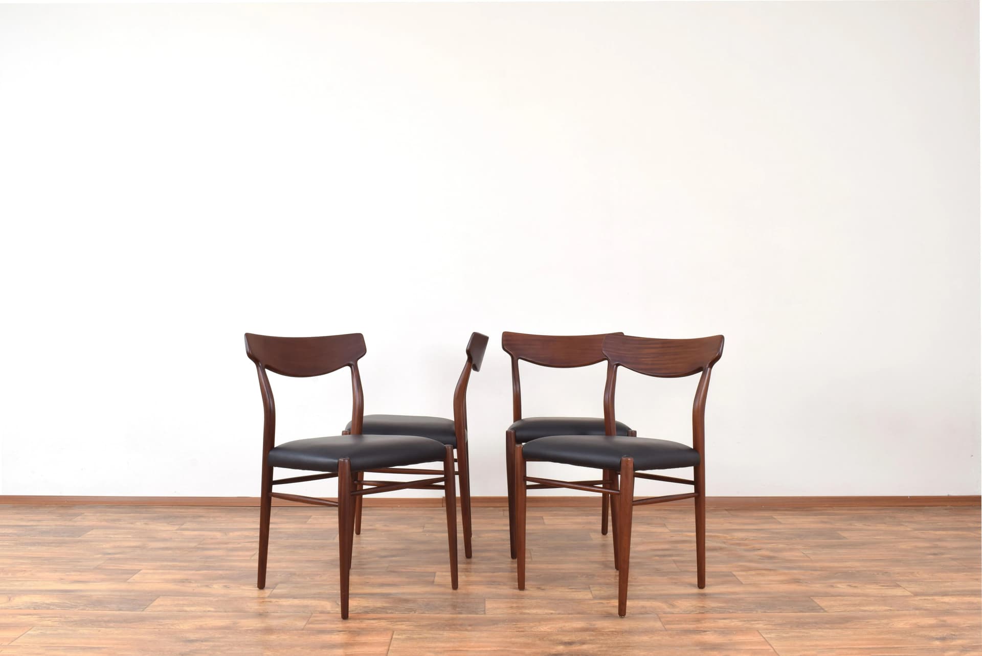 Set of four chairs, brown teak, black leather, by G. Herkströter, Lübke, Germany, 1960s. - 315155