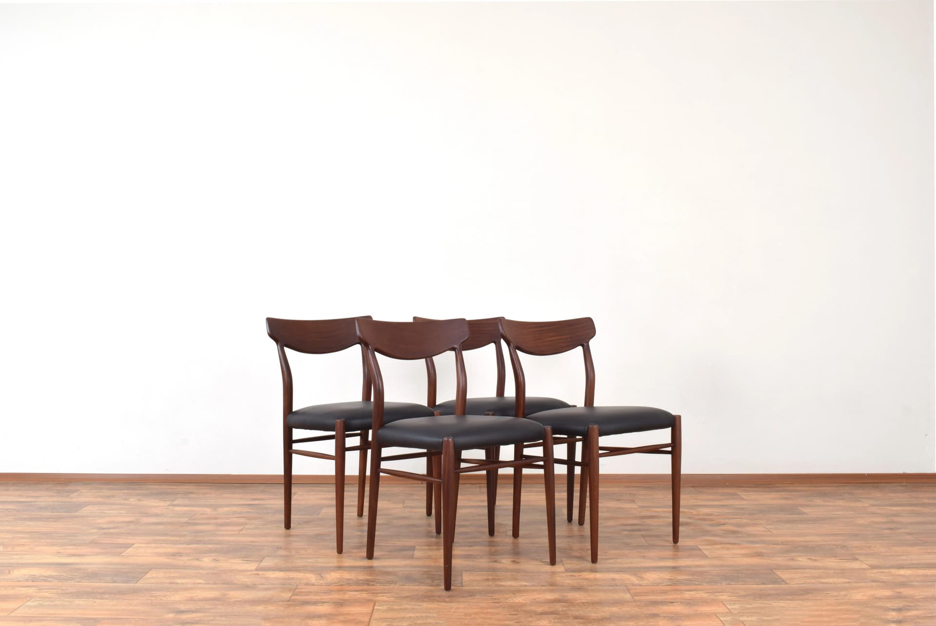 Set of four chairs, brown teak, black leather, by G. Herkströter, Lübke, Germany, 1960s. - 315154