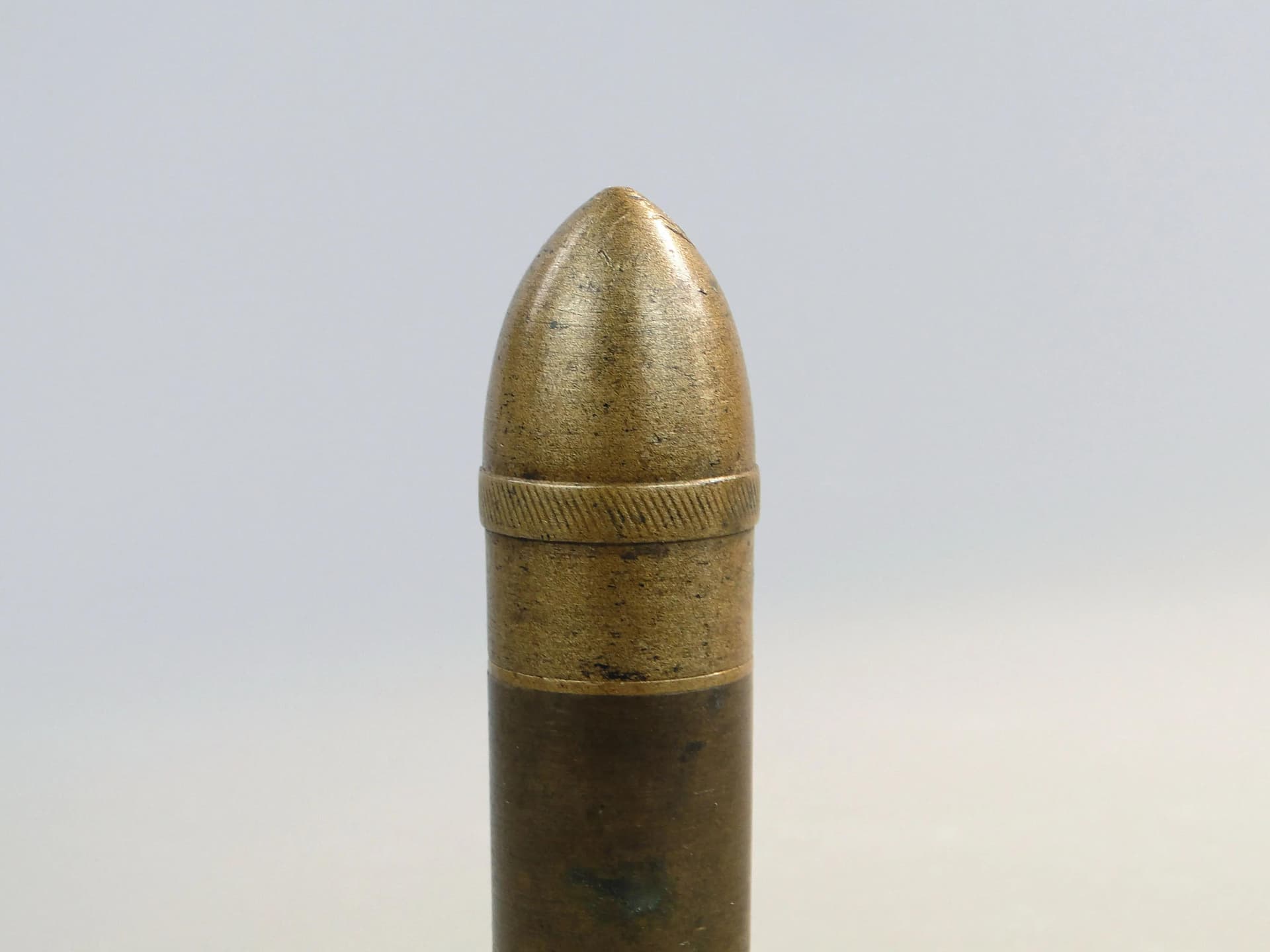 Zapalniczka benzynowa, forma pocisku, miedziany brąz, Polska, początek XX w. - 23632