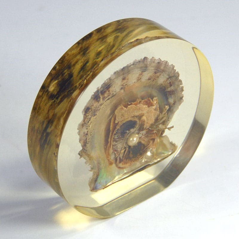 Paperweight, mid-century modern, transparent yellowish plexiglass, pearl oyster shell, 1970s - 323438