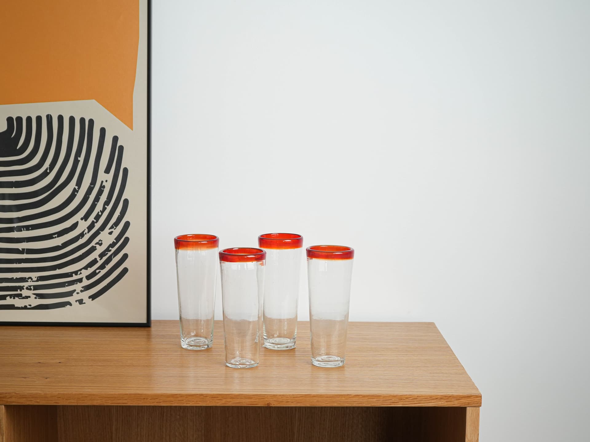 Set of four glasses, clear glass red-orange rim, Italy, 1970s. - 322061