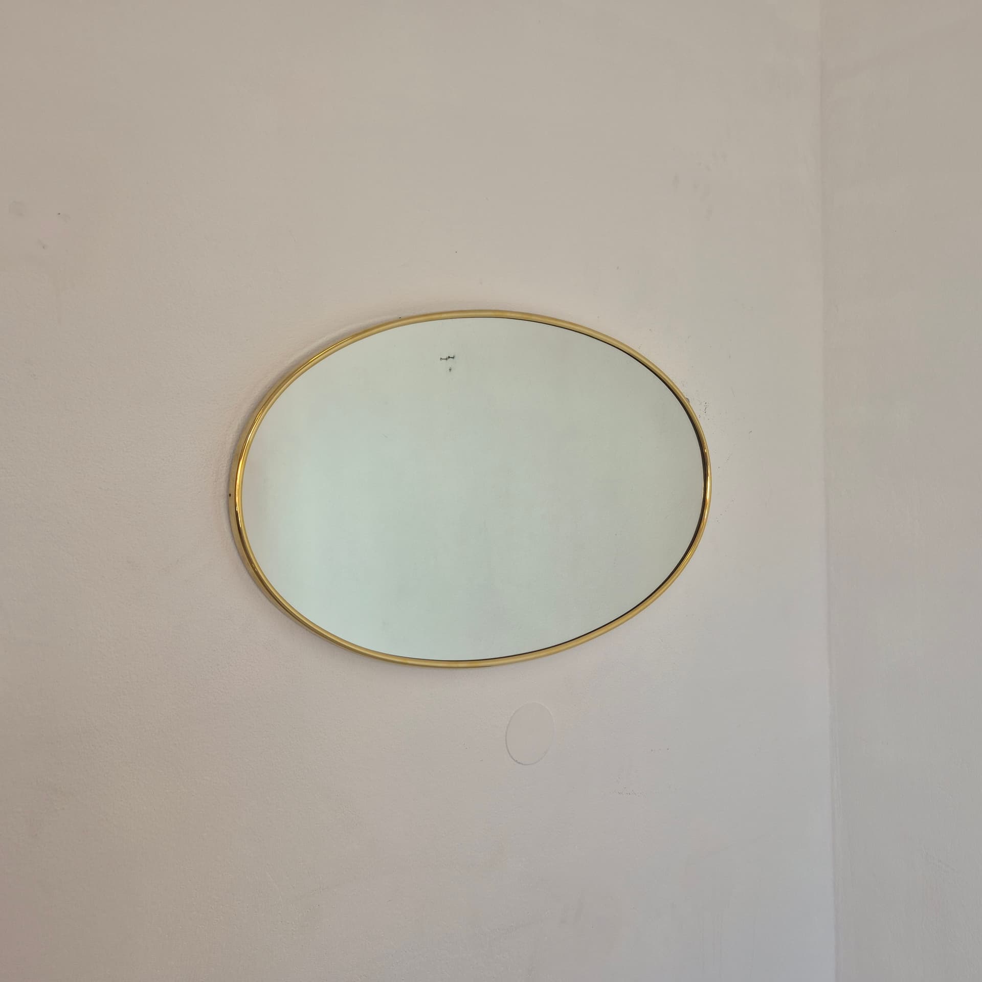 Oval mirror, gold metal, glass, Germany, 1960s. - 324284