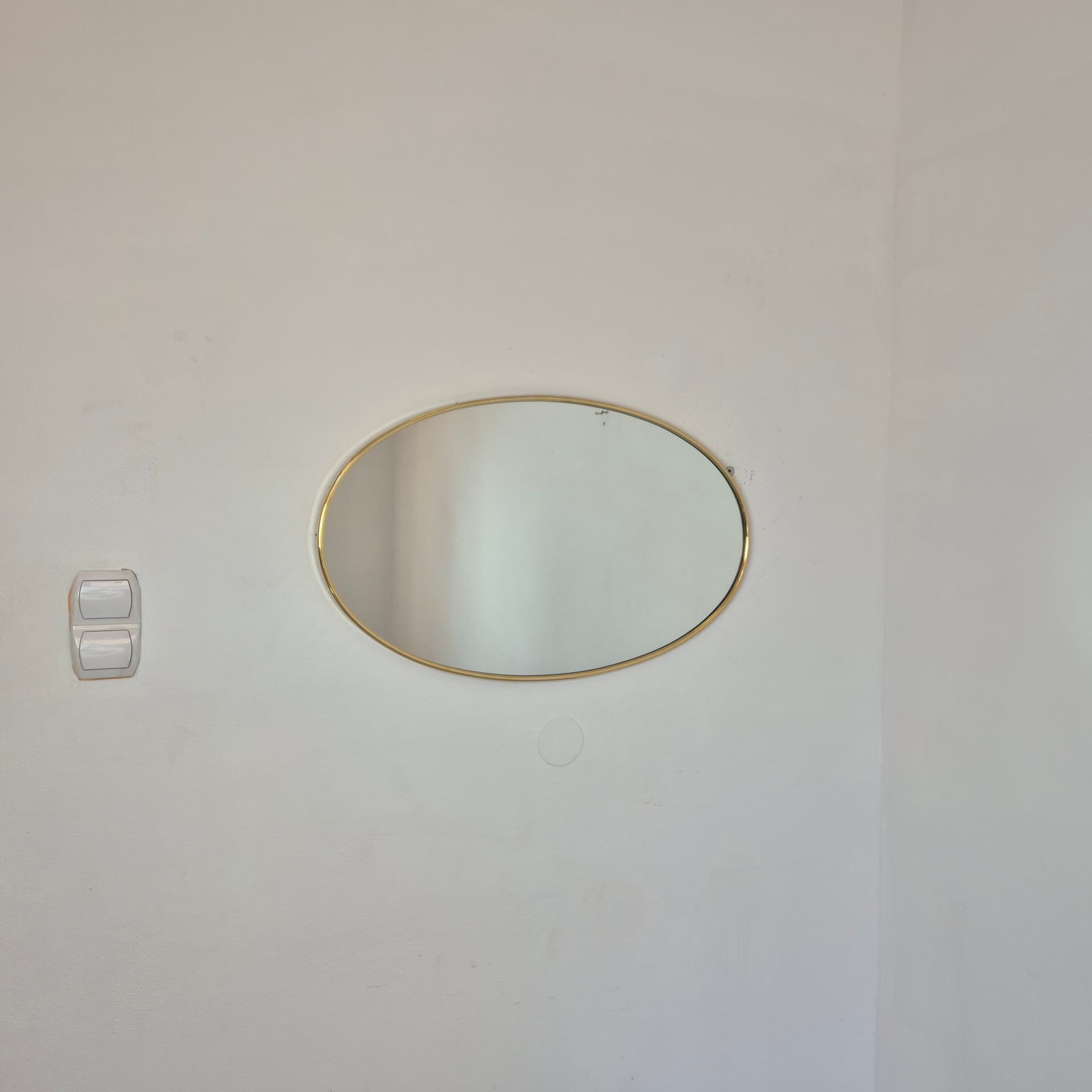 Oval mirror, gold metal, glass, Germany, 1960s. - 324285